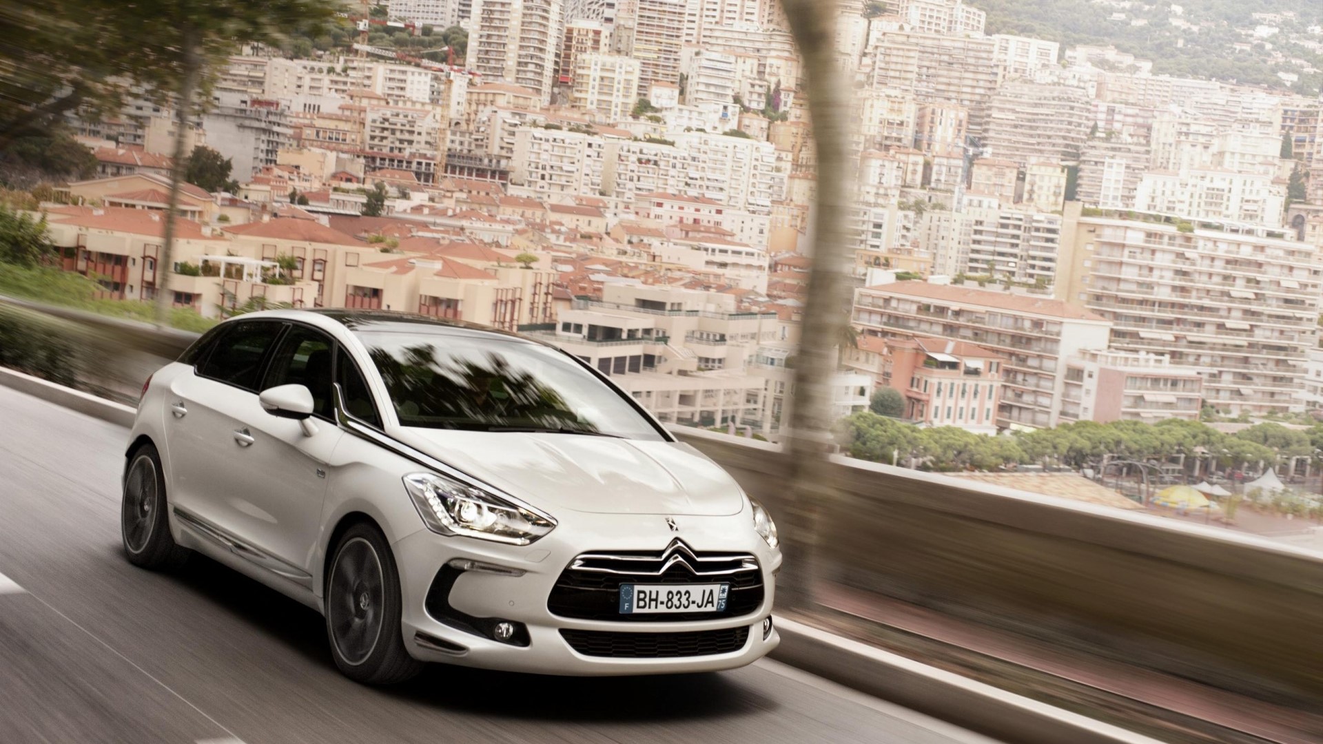 White Citroen DS5 driving in Monaco HD Wallpaper