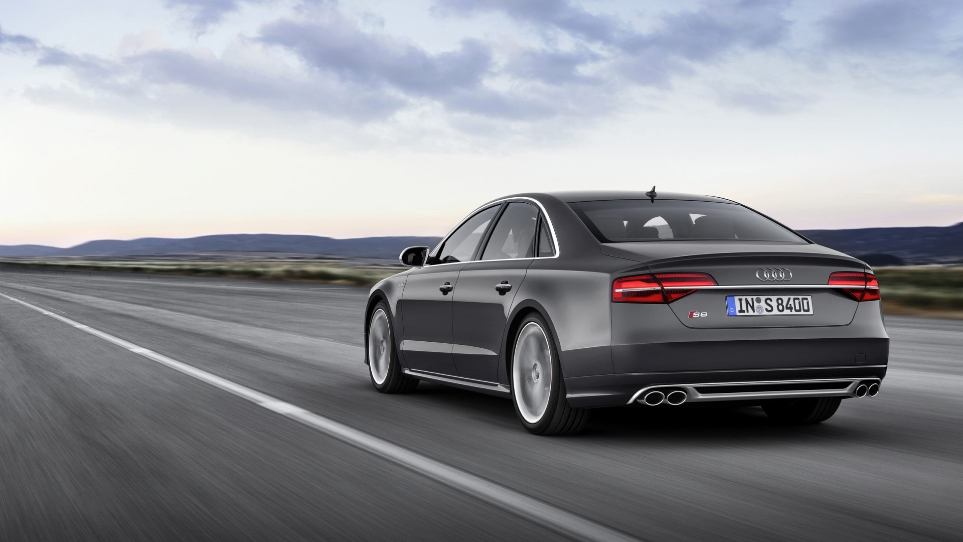 Audi S8 driving on a road HD Wallpaper