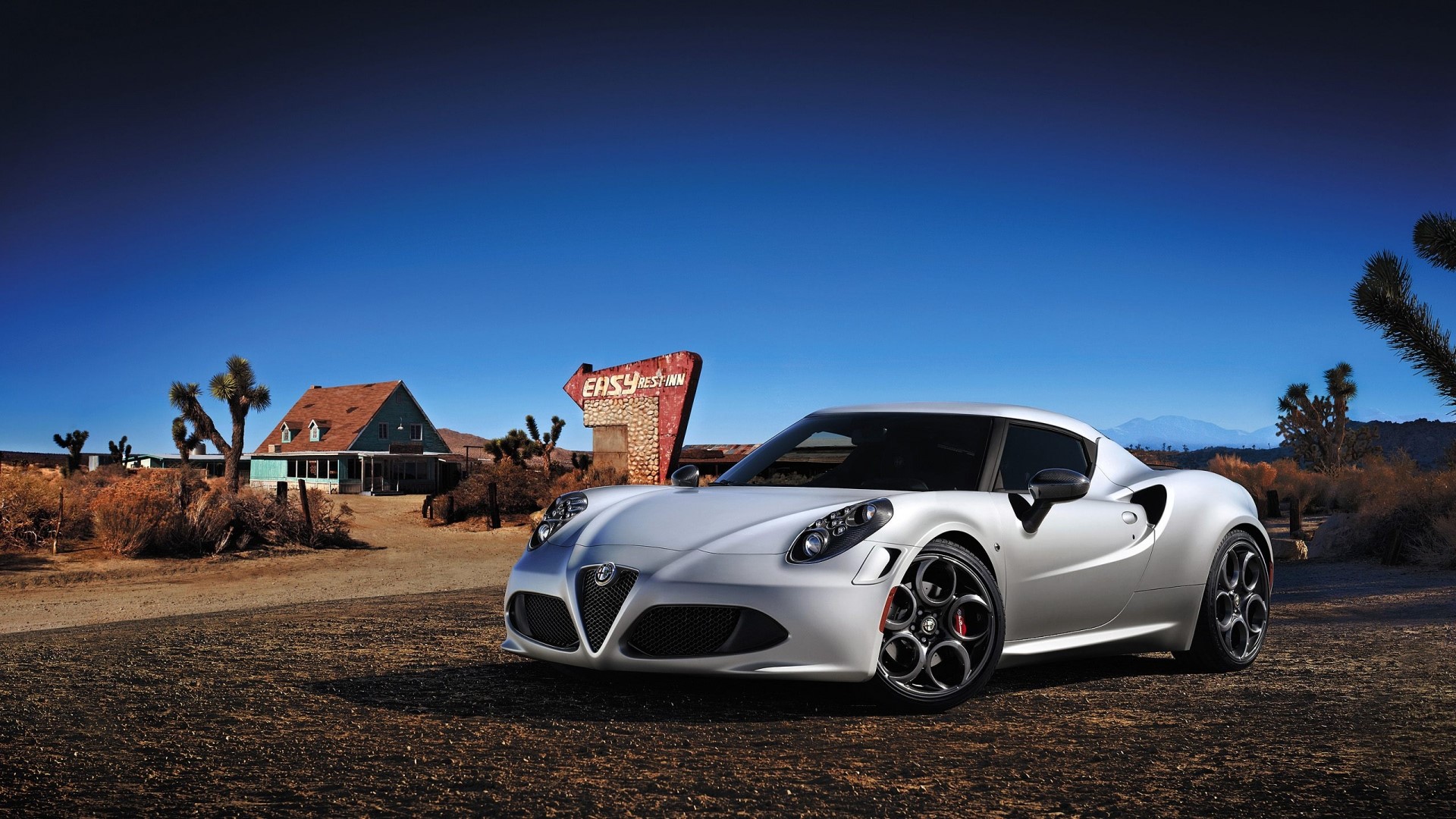 White Alfa Romeo 4C in a Desert Landscape HD Wallpaper
