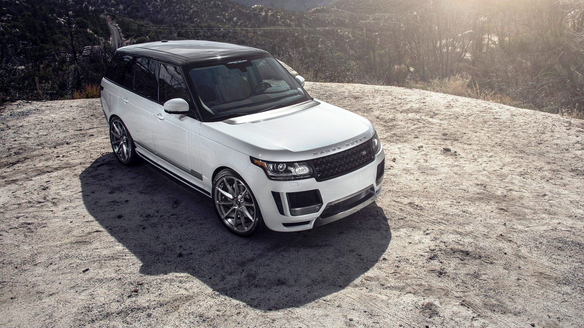 White Range Rover on a dirt road HD Wallpaper