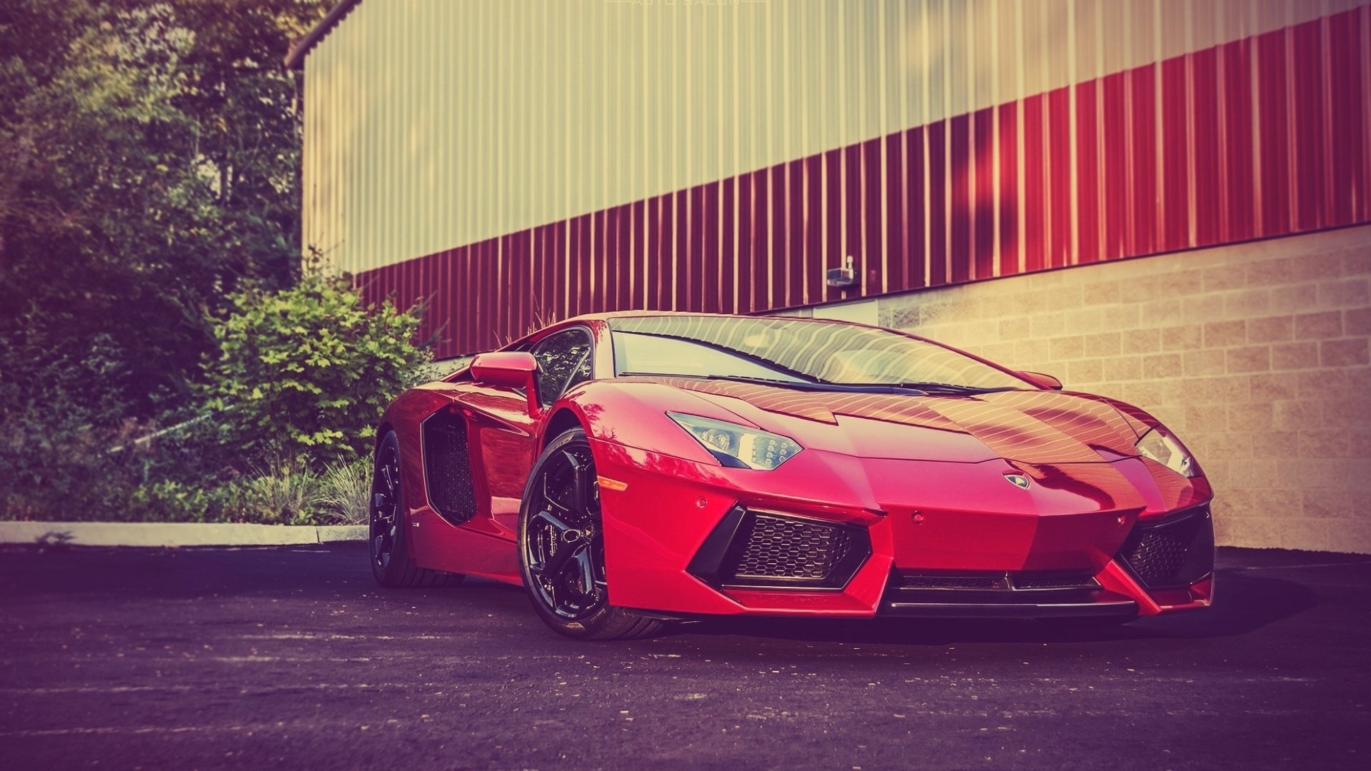 Red Lamborghini Aventador parked outside building HD Wallpaper