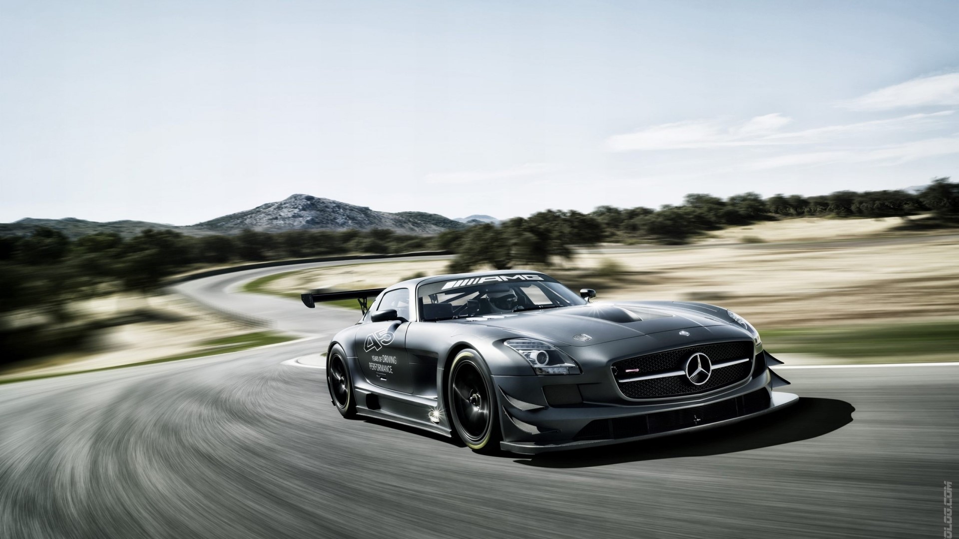 Mercedes-Benz SLS AMG GT3 race car on a track HD Wallpaper
