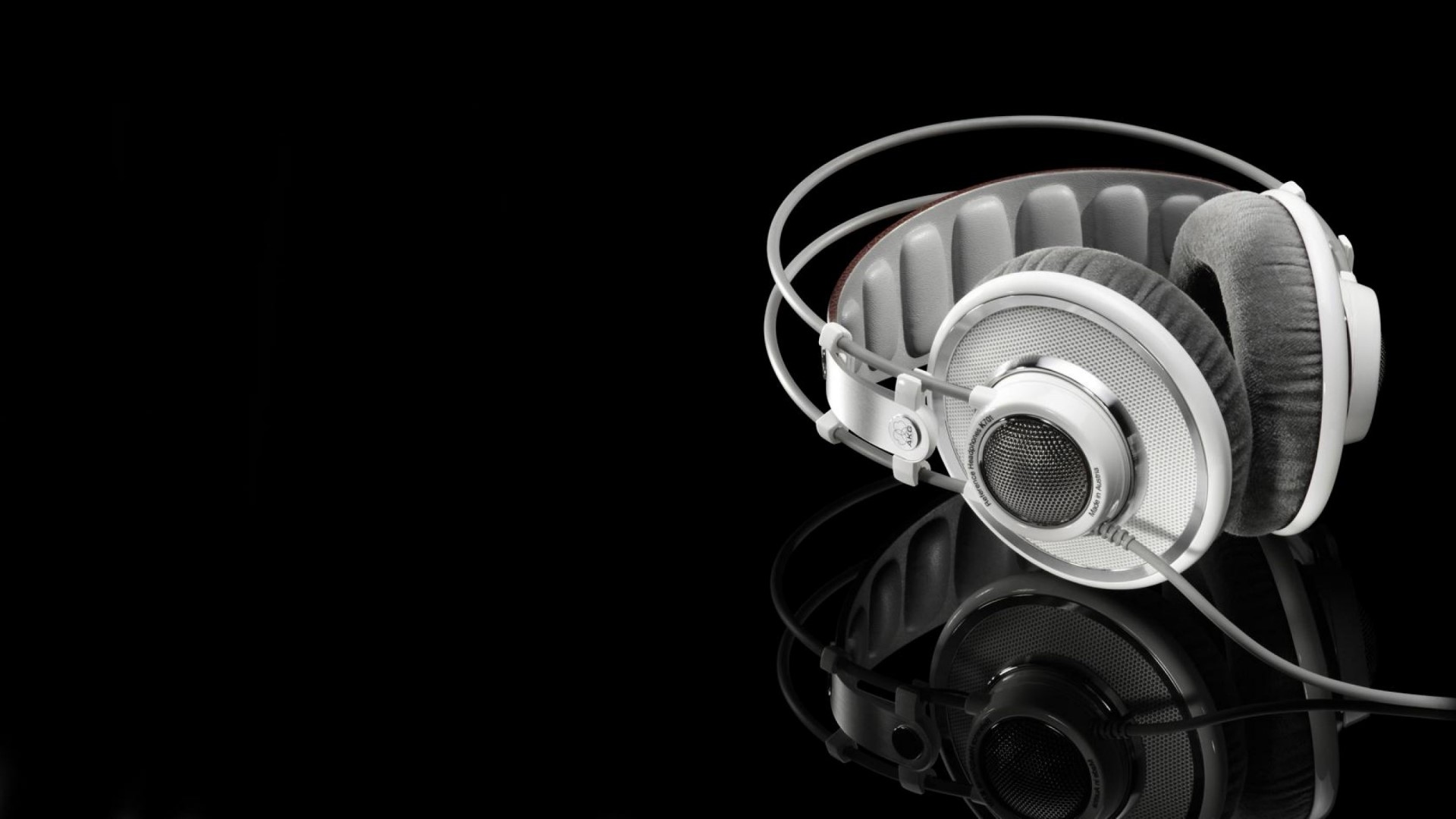 White and gray headphones on black background HD Wallpaper