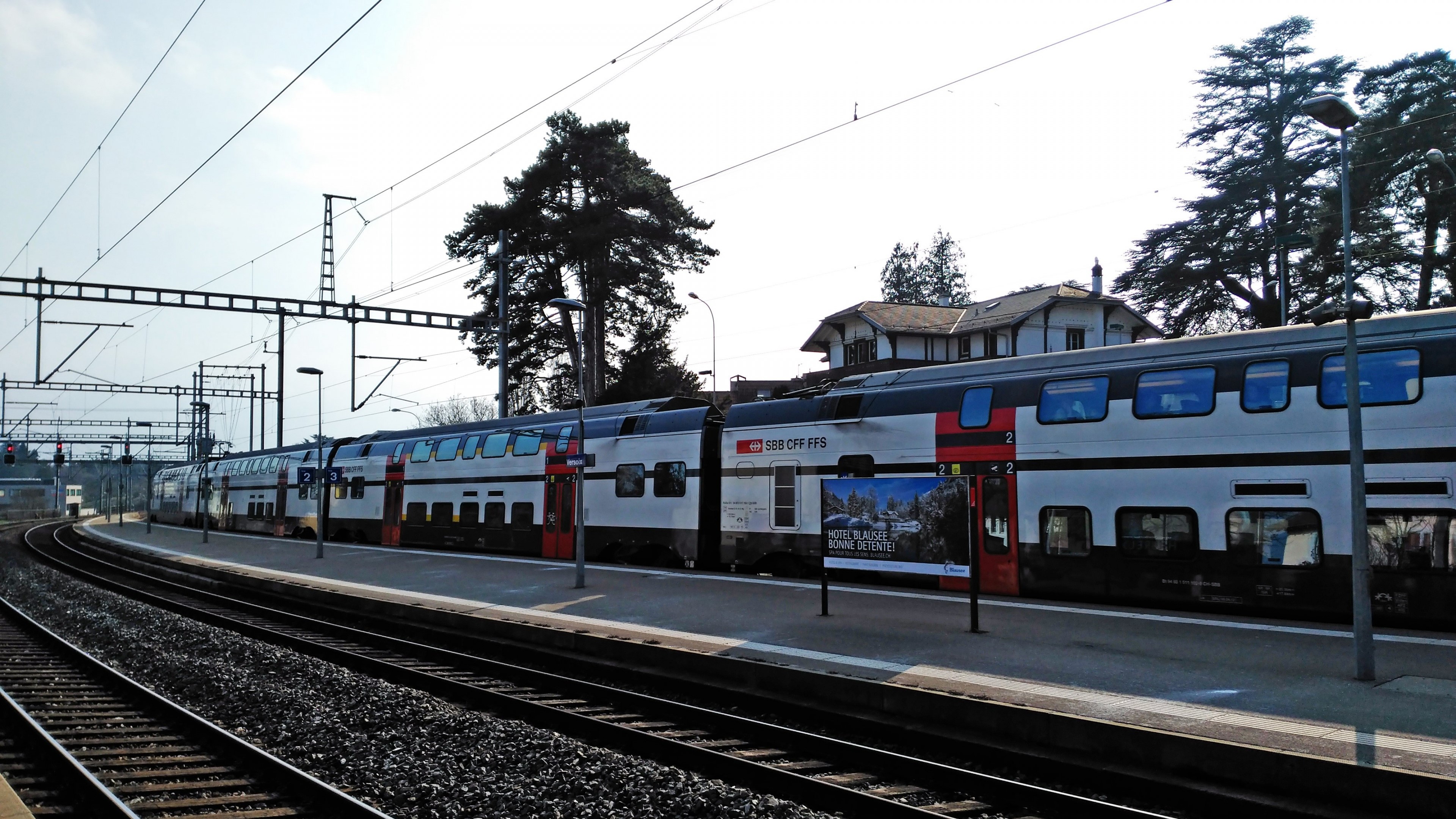 Swiss Railways Train at Station HD Wallpaper