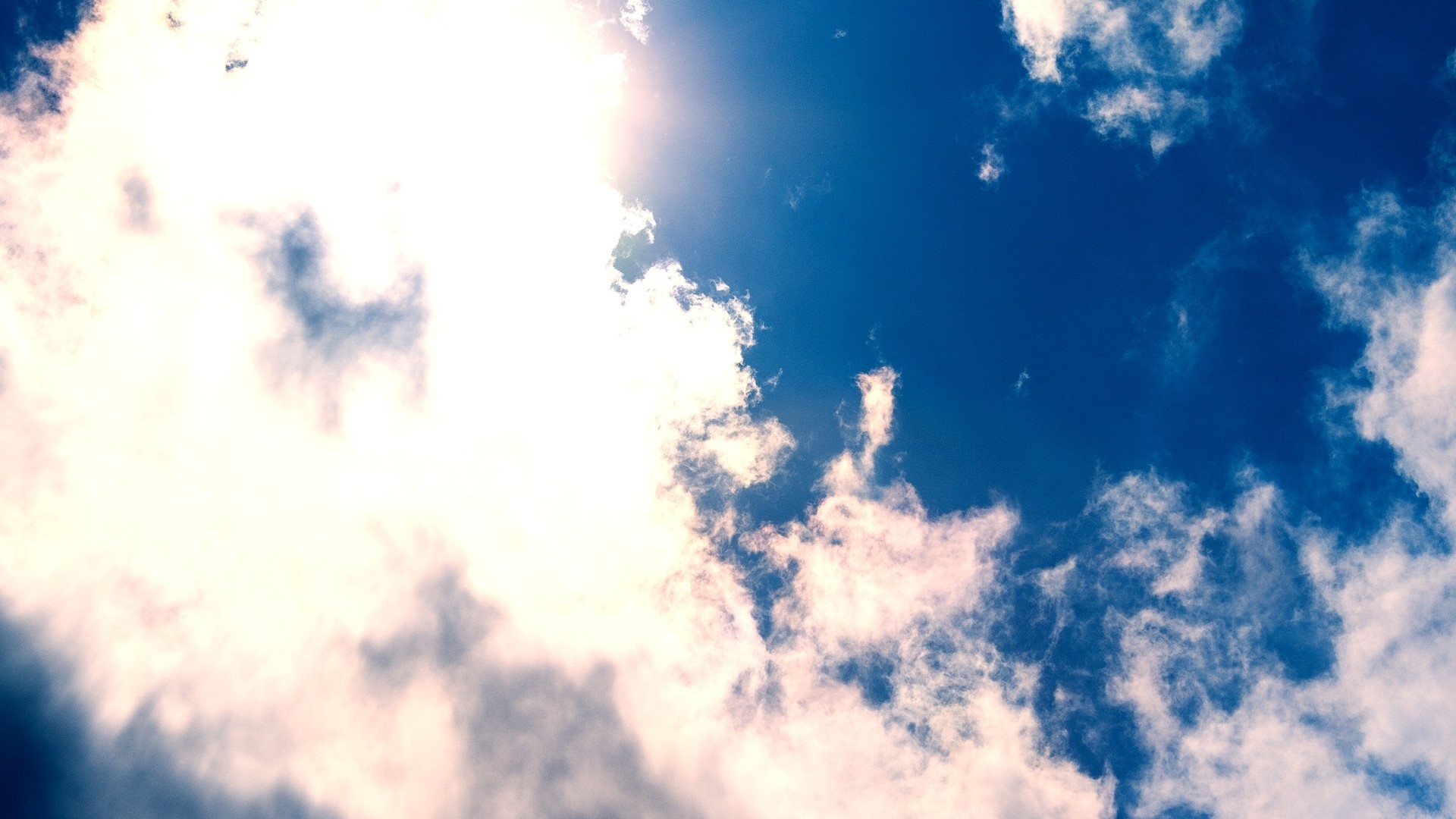 Blue sky with white clouds and sun HD Wallpaper