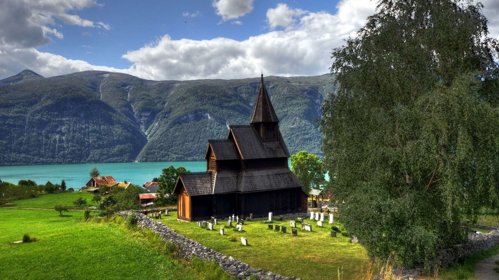 Wooden church in Norway by a lake HD Wallpaper