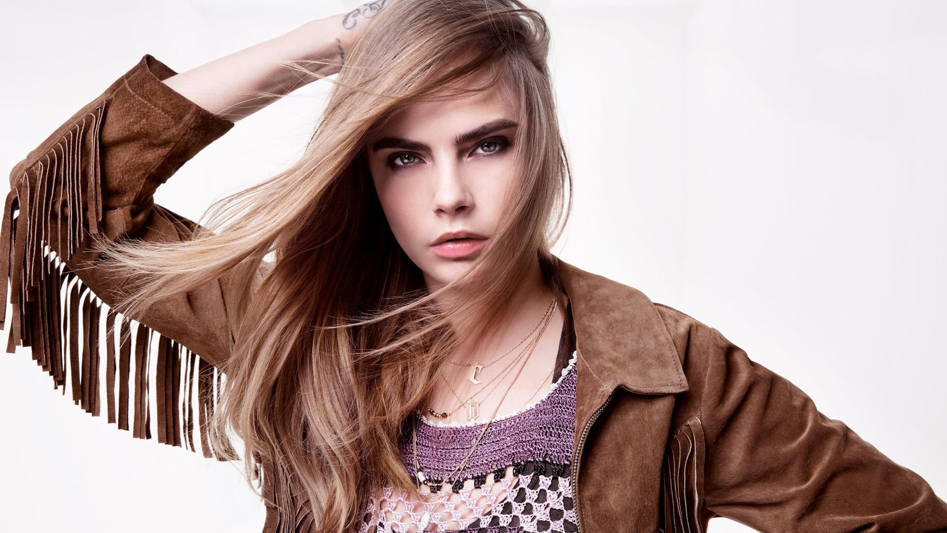 Cara Delevingne in Suede Fringe Jacket HD Wallpaper