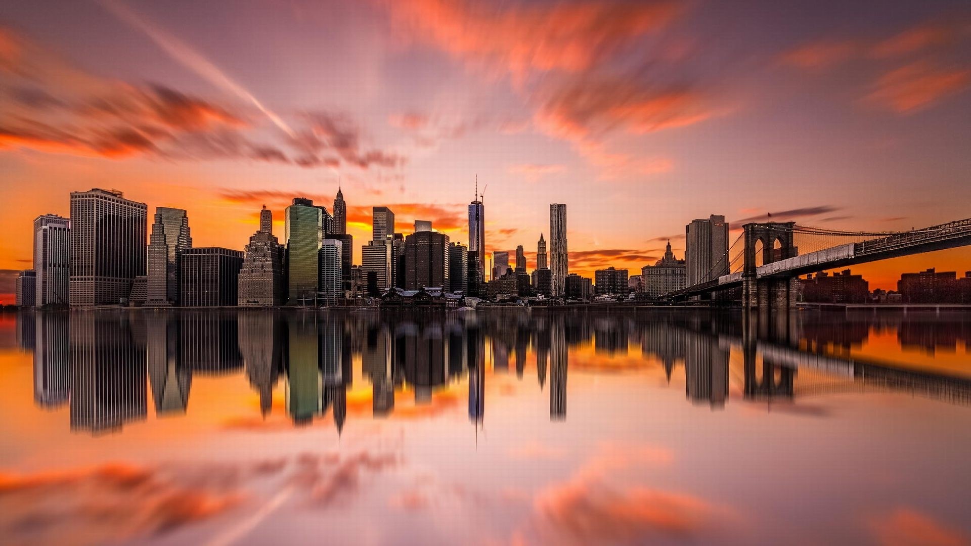 New York City skyline at sunset with Brooklyn Bridge HD Wallpaper