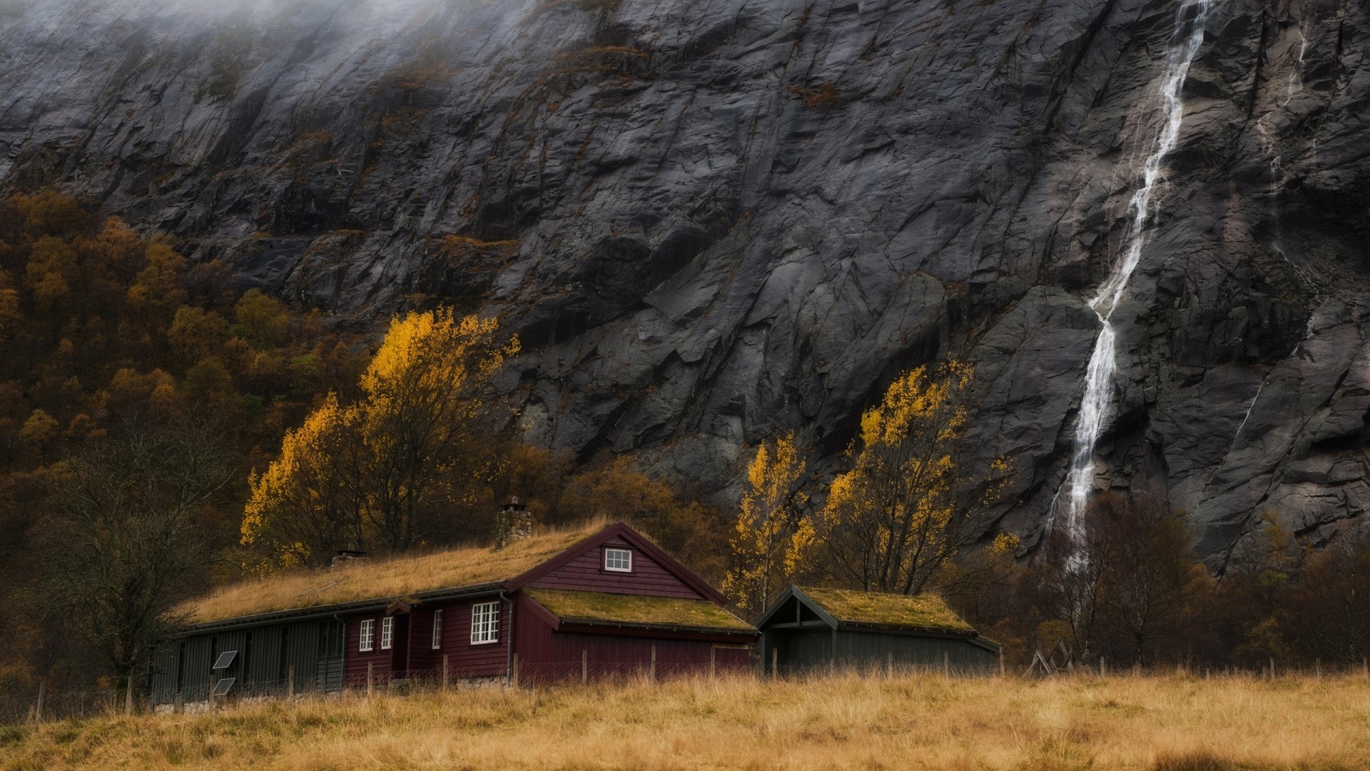 Waterfall near houses in Norway HD Wallpaper