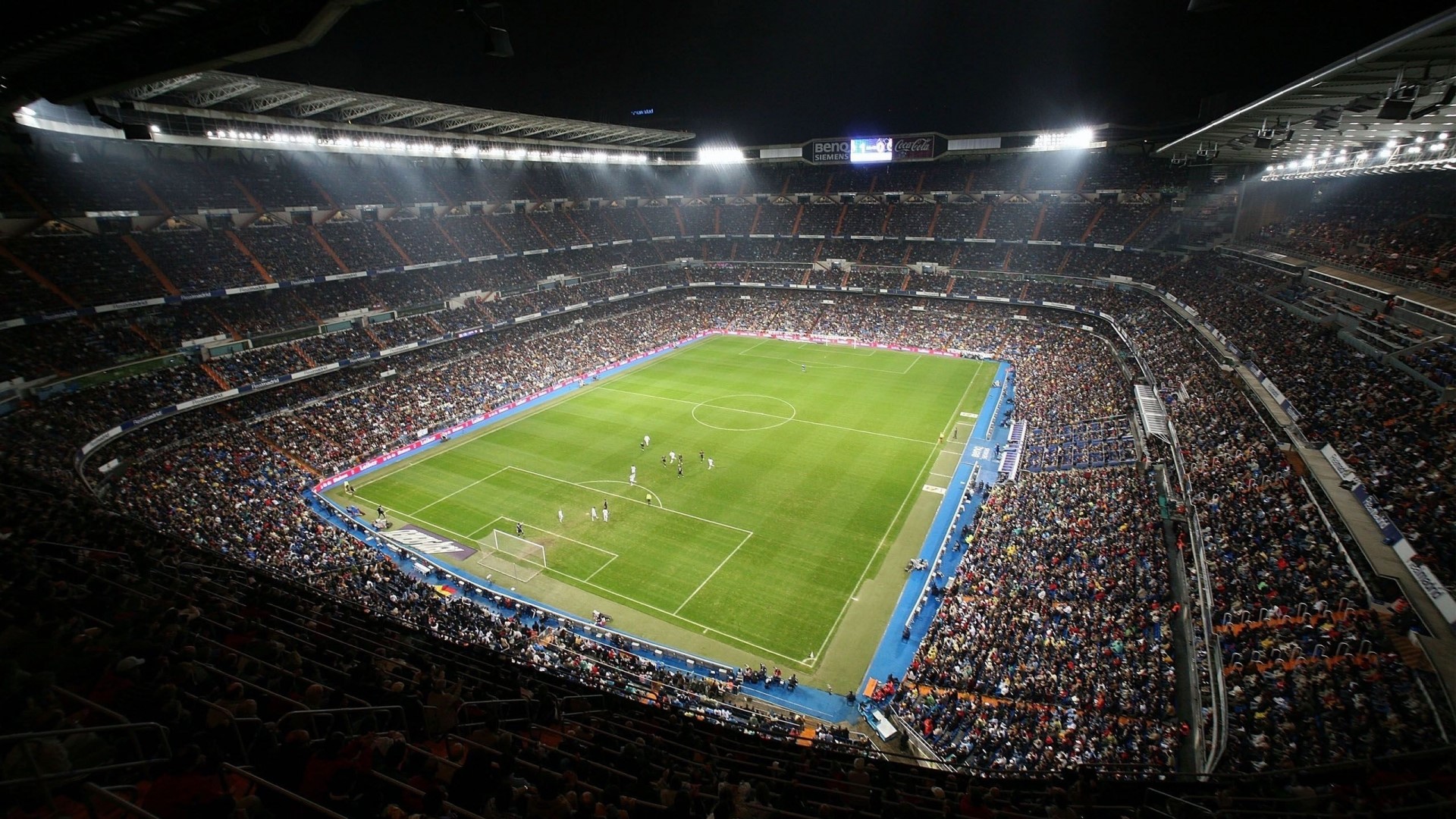 Santiago Bernabeu Stadium with soccer players HD Wallpaper