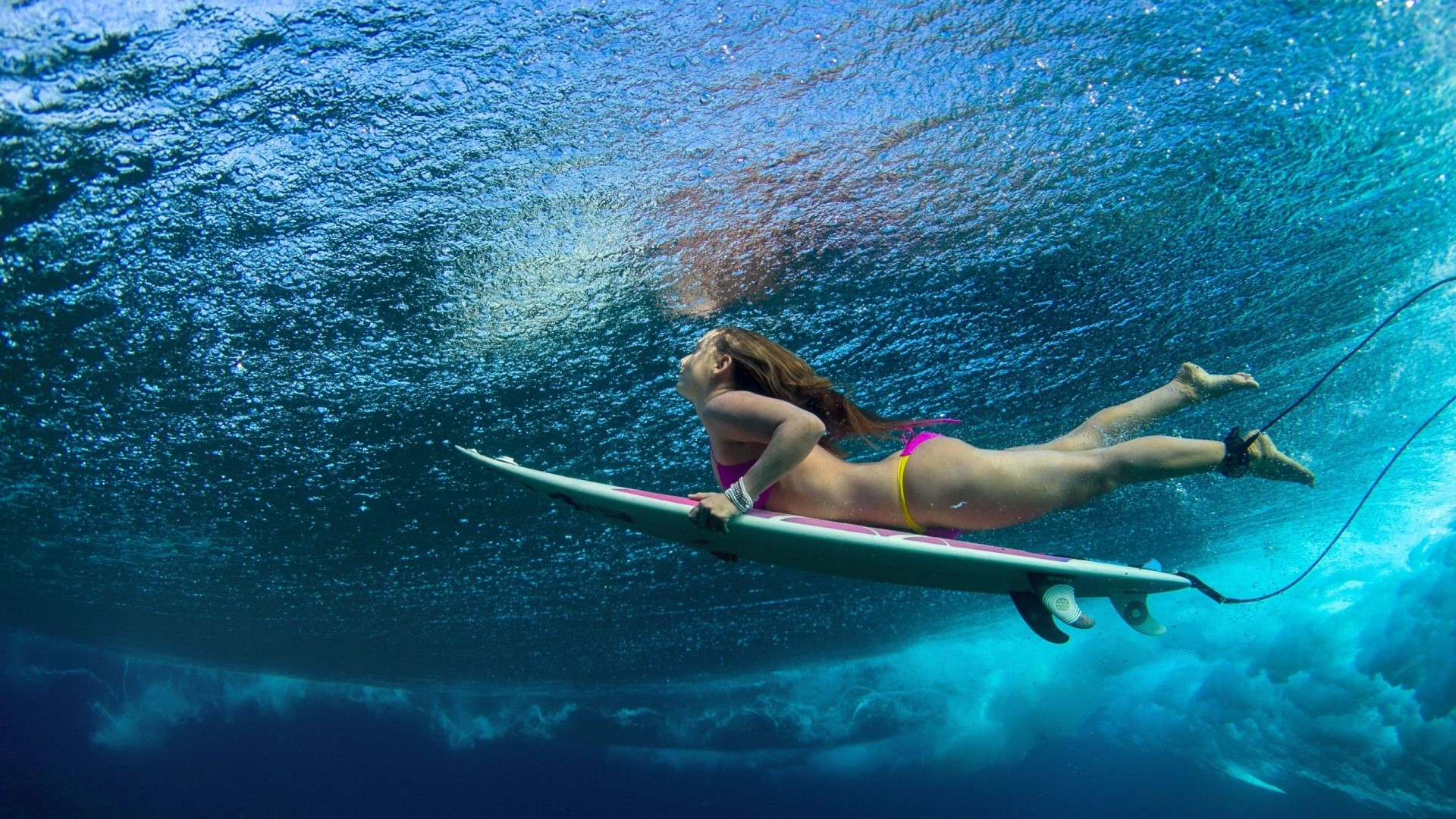 Surfer girl underwater on surfboard HD Wallpaper