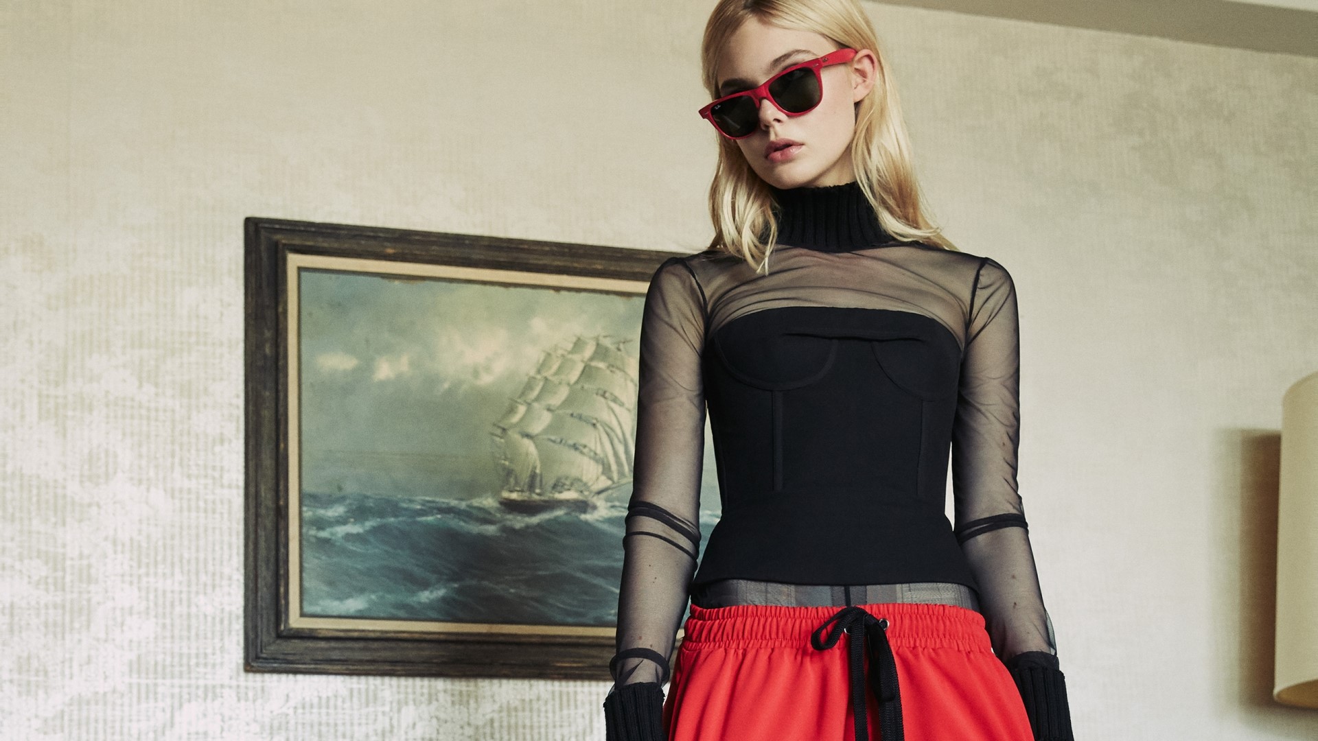 Elle Fanning in red sunglasses and black top HD Wallpaper