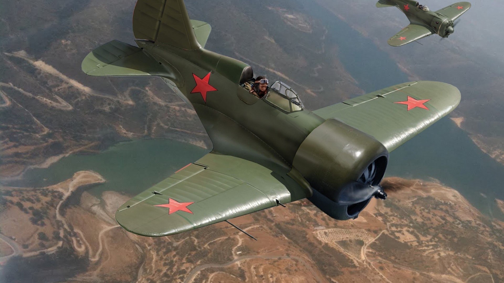 Two Soviet-era fighter planes in flight HD Wallpaper