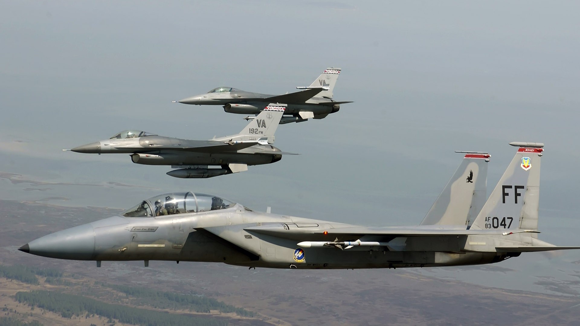 F-15 Eagle and F-16 Fighting Falcons in flight HD Wallpaper