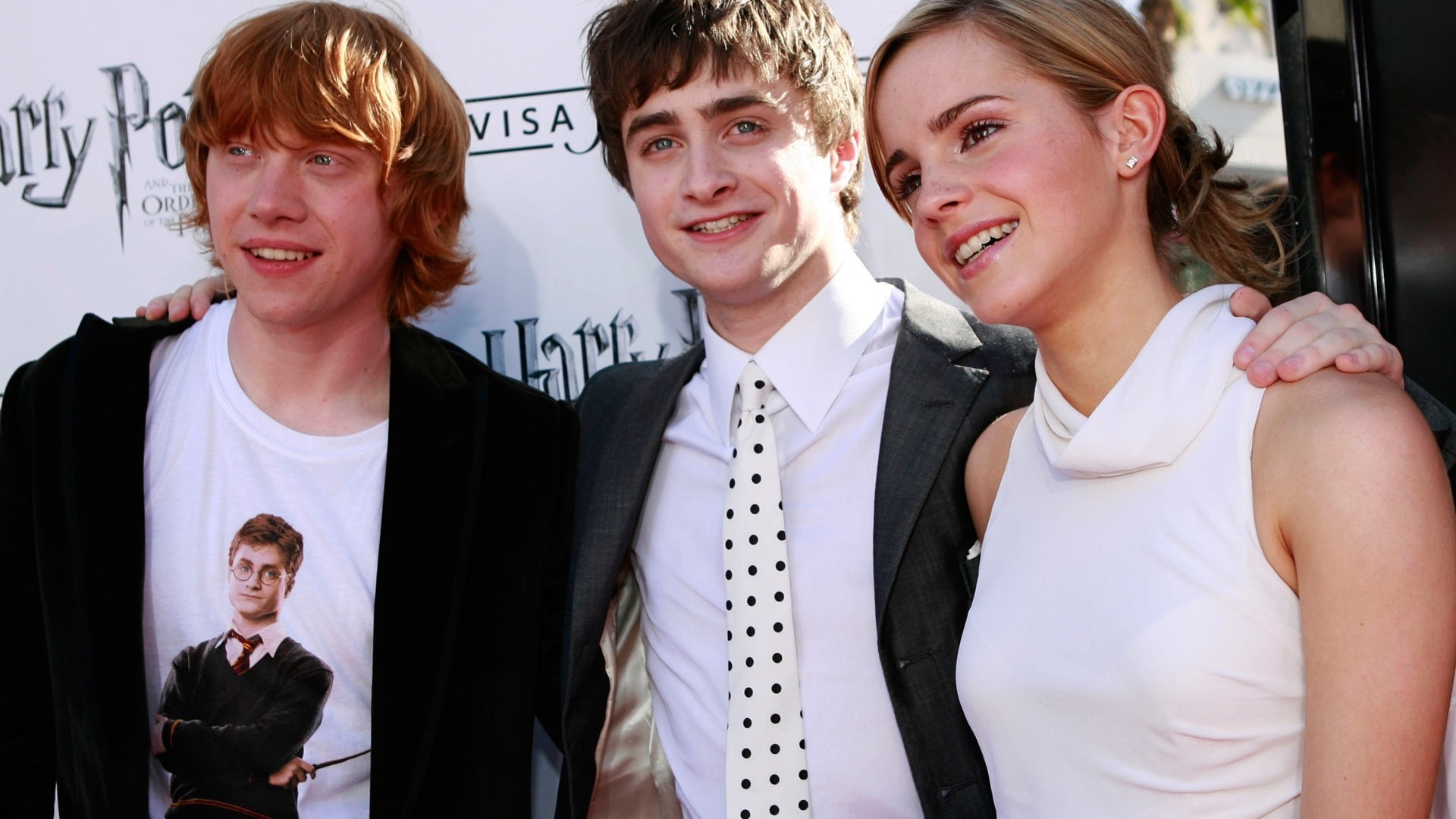 Rupert Grint, Daniel Radcliffe, and Emma Watson at Harry Potter premiere HD Wallpaper