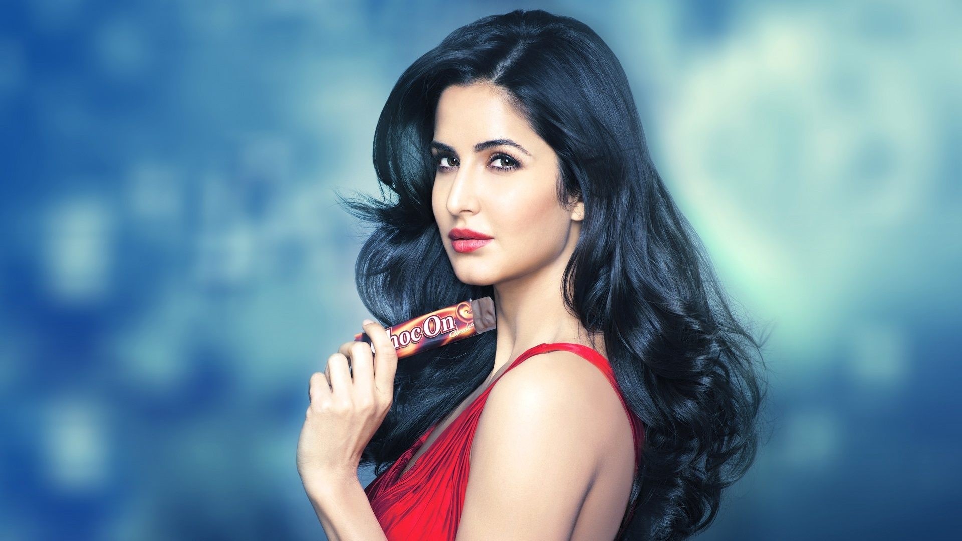 Katrina Kaif holding Choc On chocolate bar HD Wallpaper