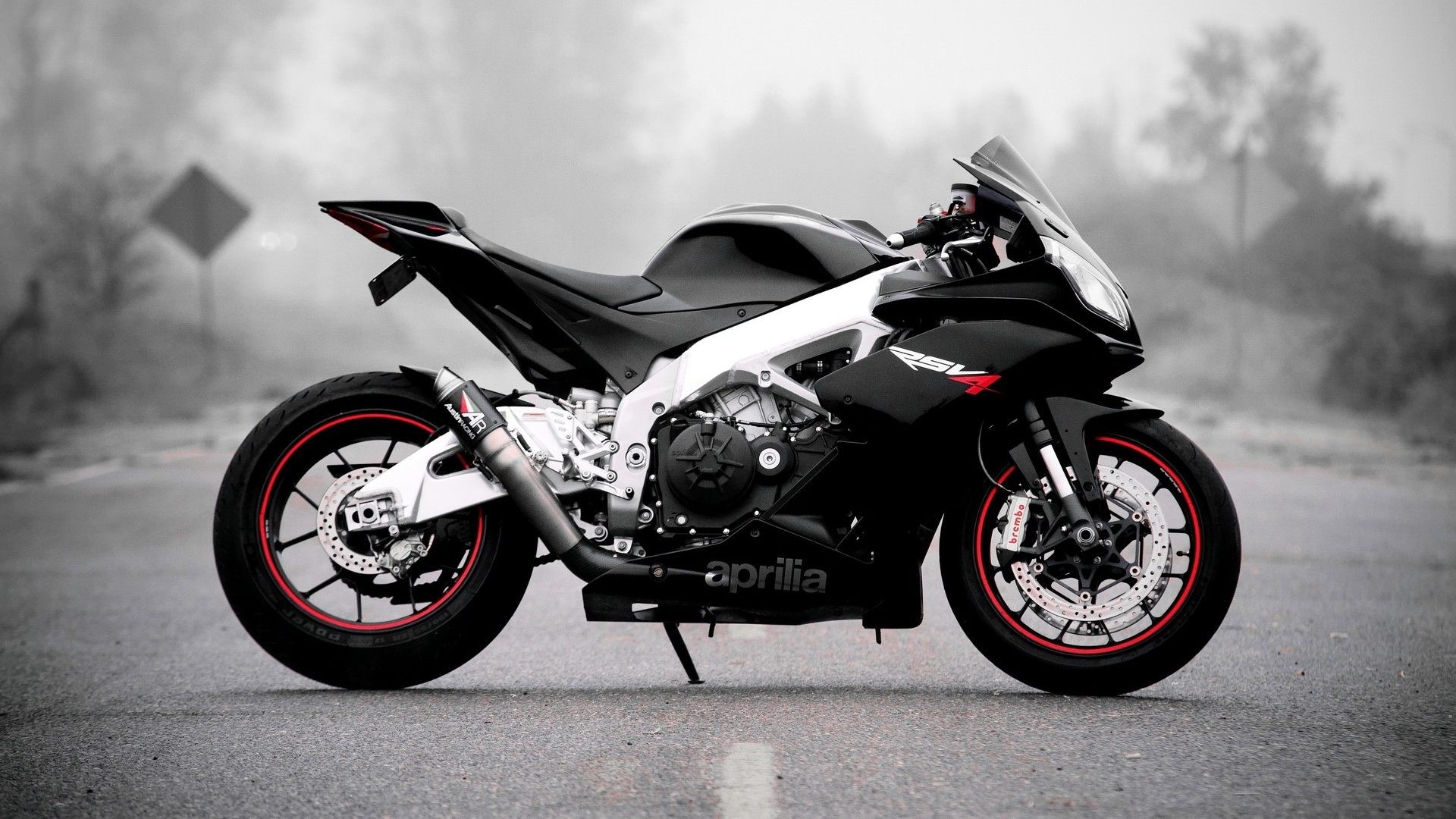 Black Aprilia RSV4 Motorcycle on a Road HD Wallpaper