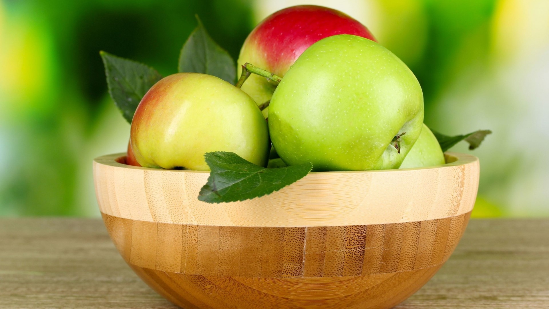 Apples in a wooden bowl HD Wallpaper