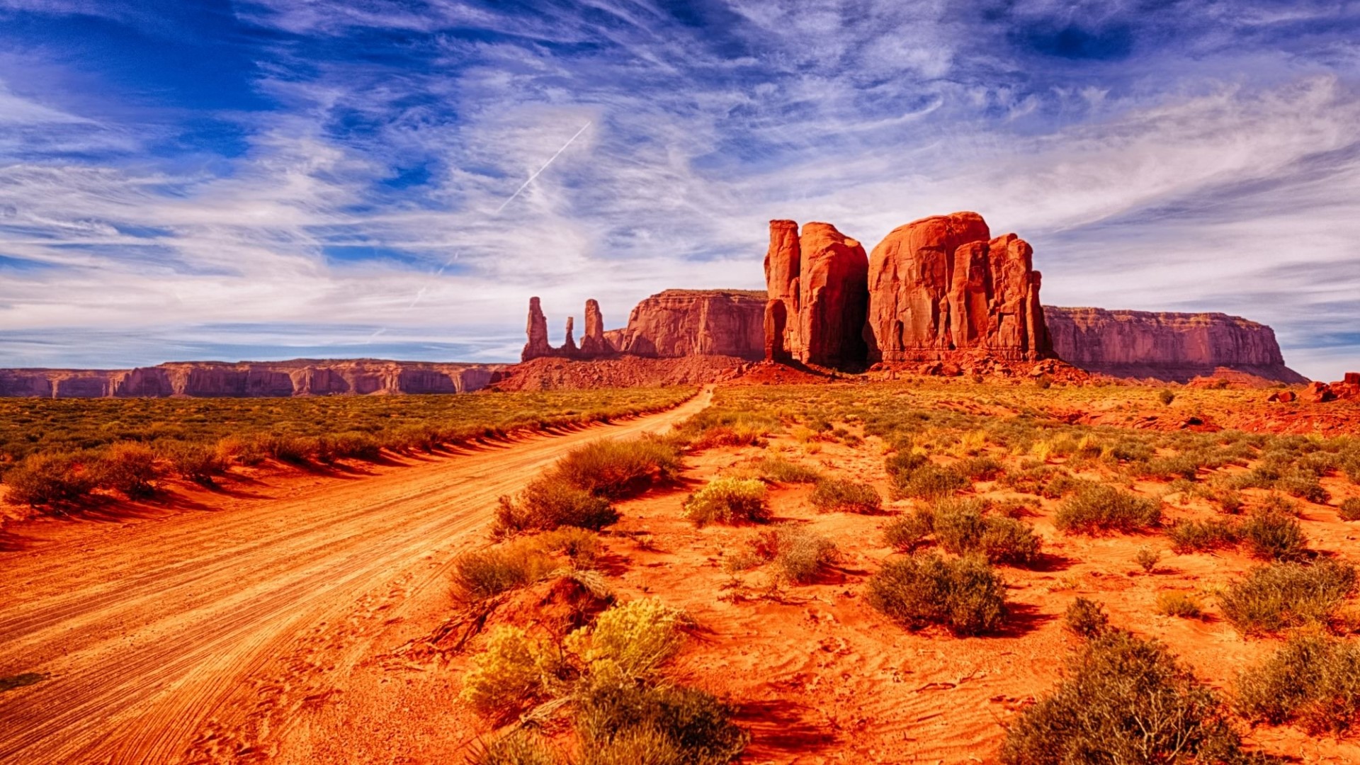 Road to Monument Valley with Red Rock Formations HD Wallpaper