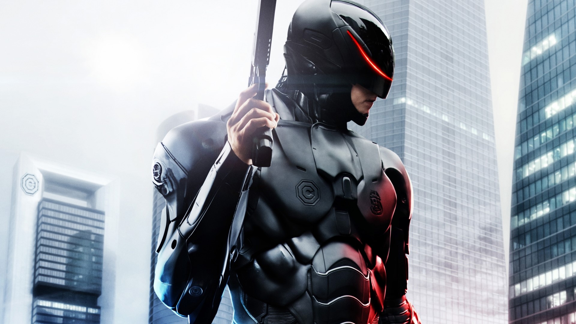 RoboCop in a futuristic city HD Wallpaper