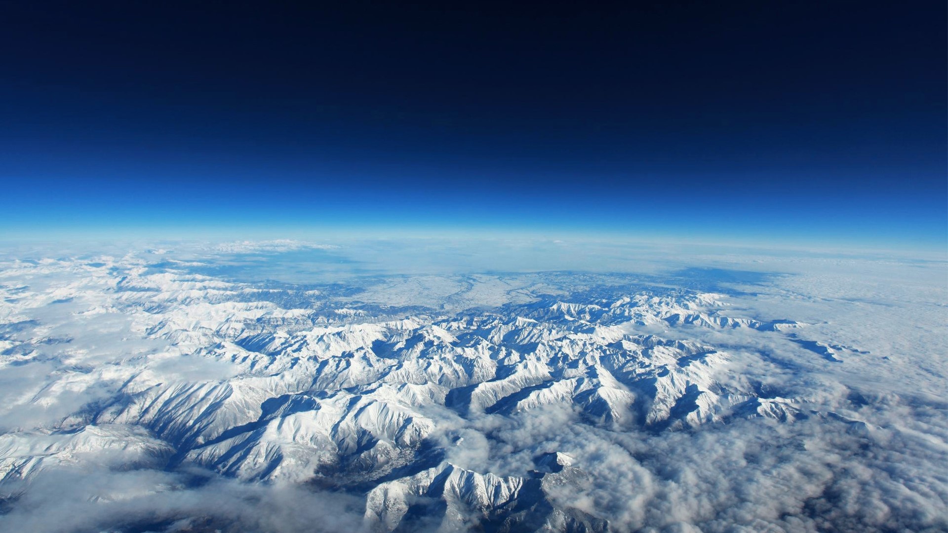 Snowy Mountain Range from Above HD Wallpaper