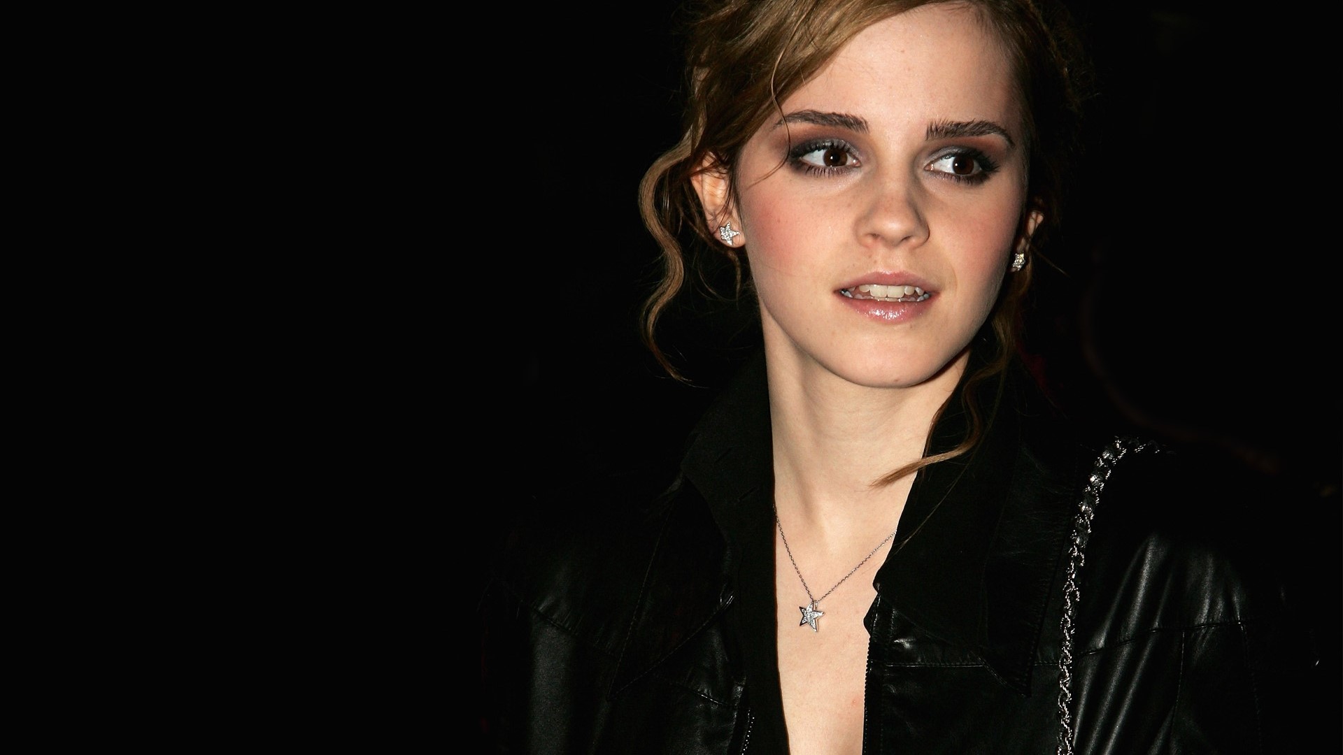 Emma Watson in a black coat HD Wallpaper