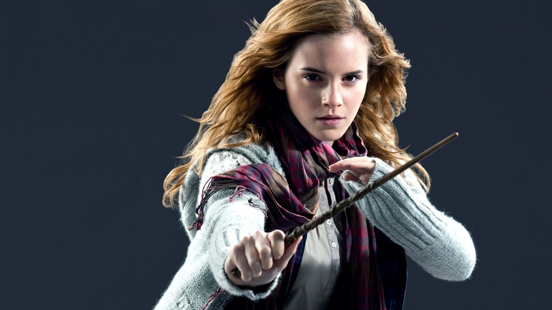 Hermione Granger from Harry Potter holding a wand HD Wallpaper