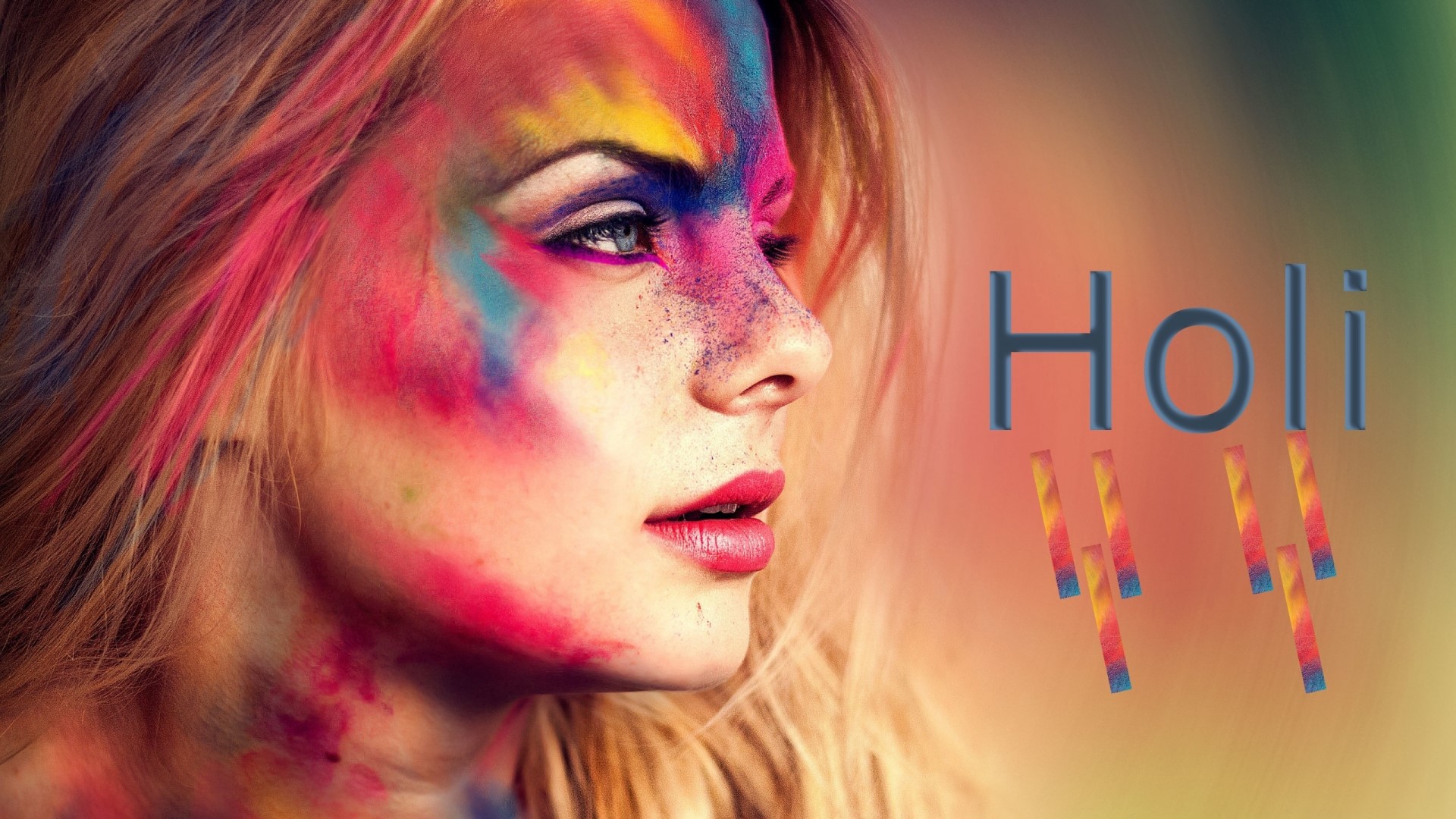Woman with colorful powder on face for Holi festival HD Wallpaper