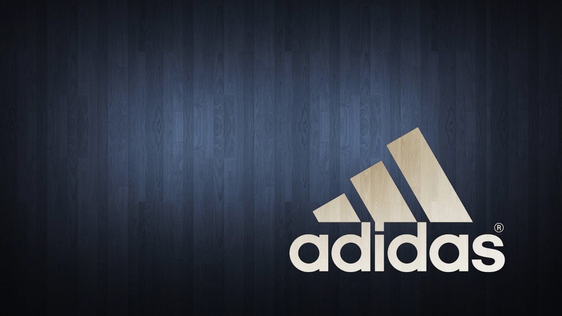 Adidas logo on a dark wooden background HD Wallpaper