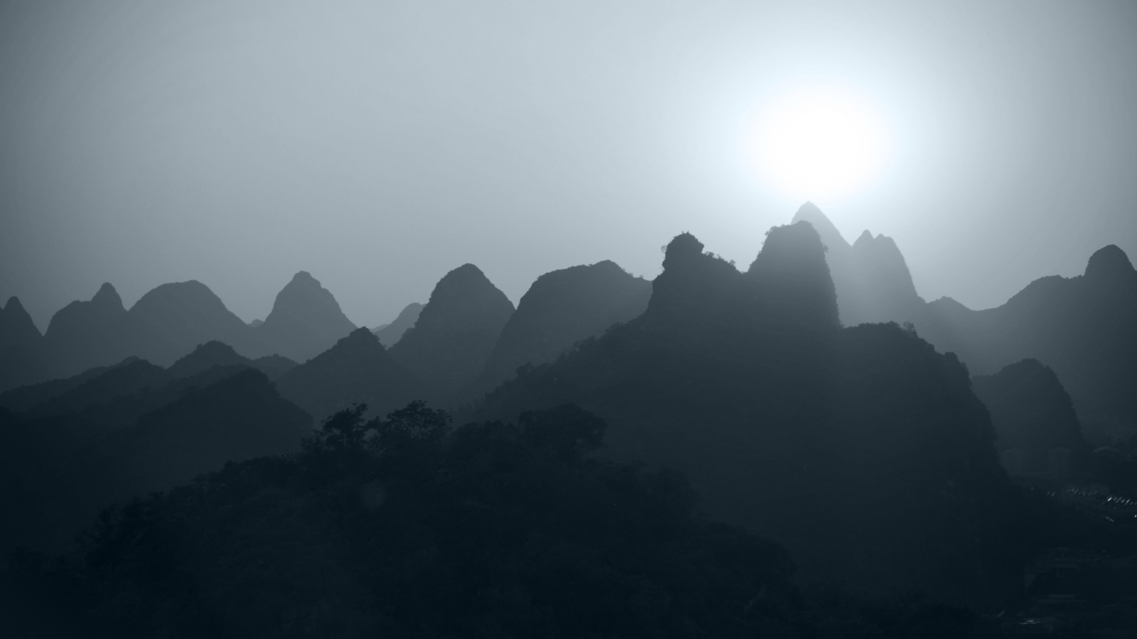 Misty Mountains at Sunrise HD Wallpaper