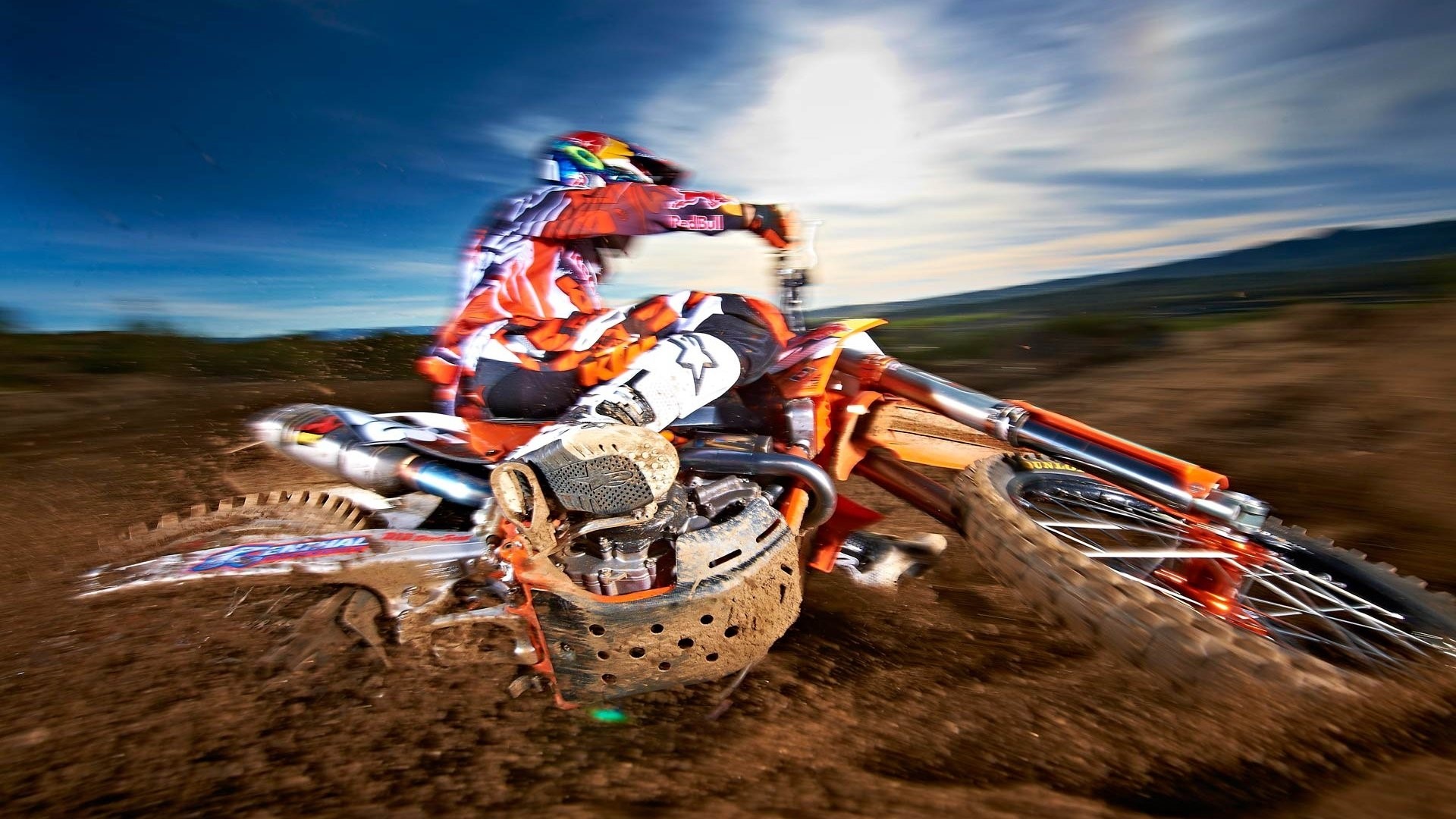Motocross rider on a dirt bike HD Wallpaper