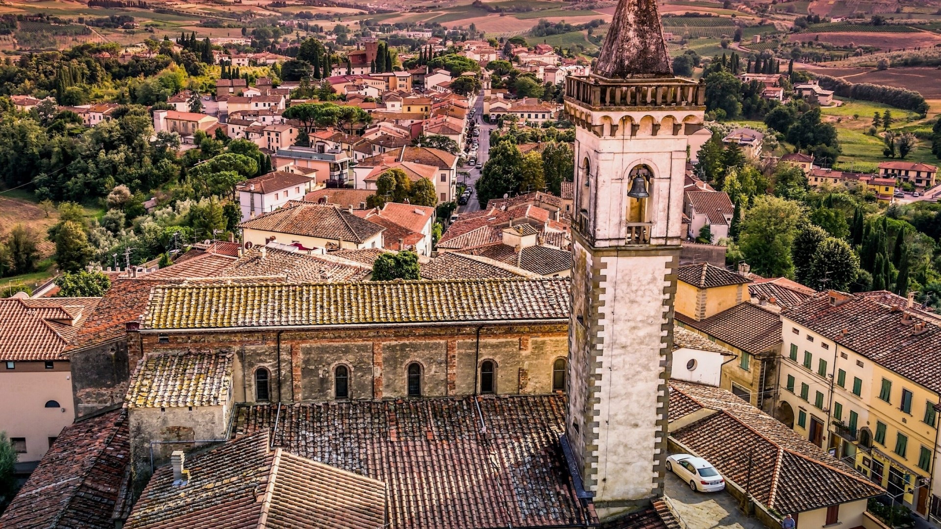 Aerial view of Vinci, Italy with church tower HD Wallpaper