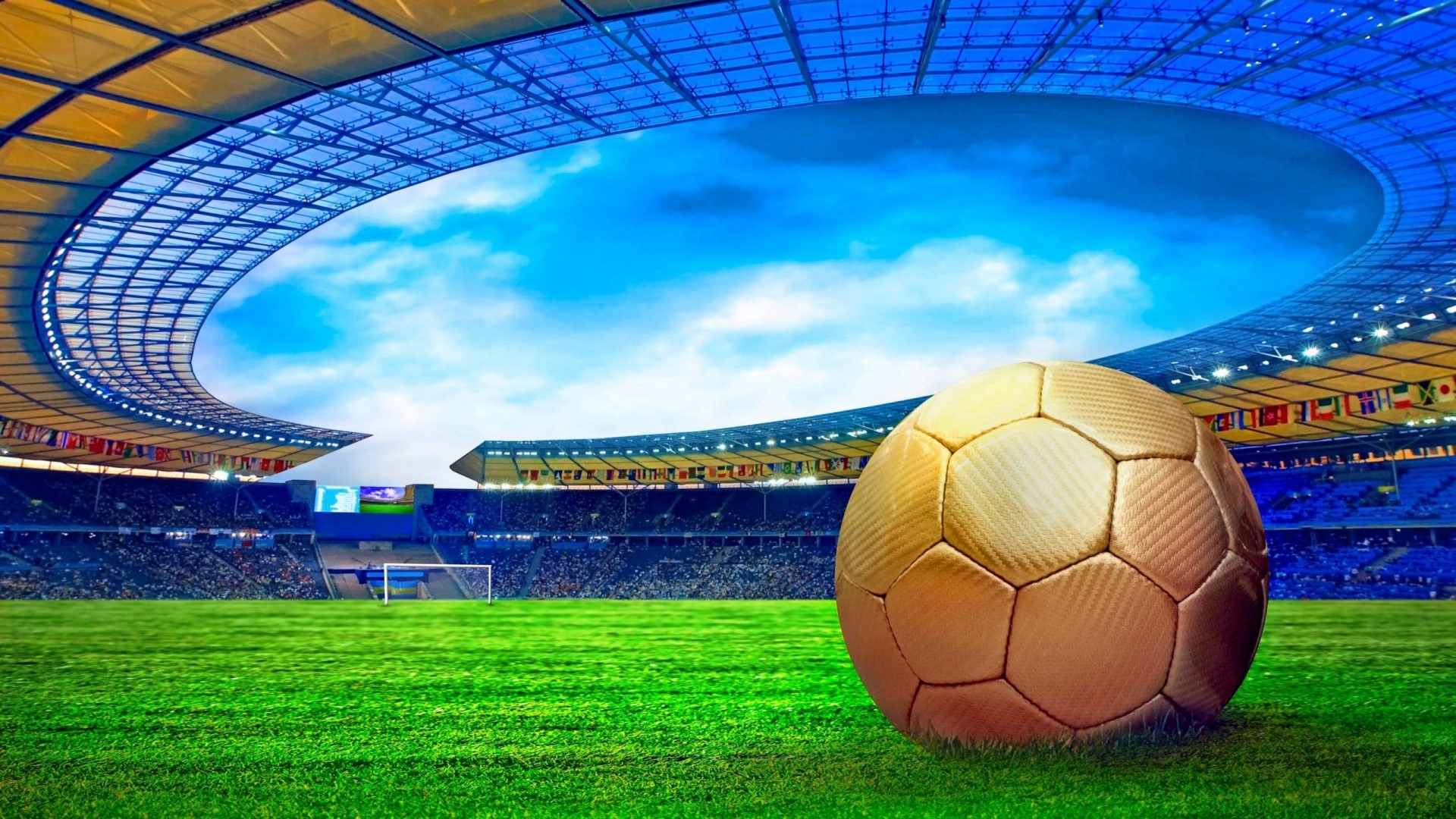 Golden soccer ball on a stadium field HD Wallpaper
