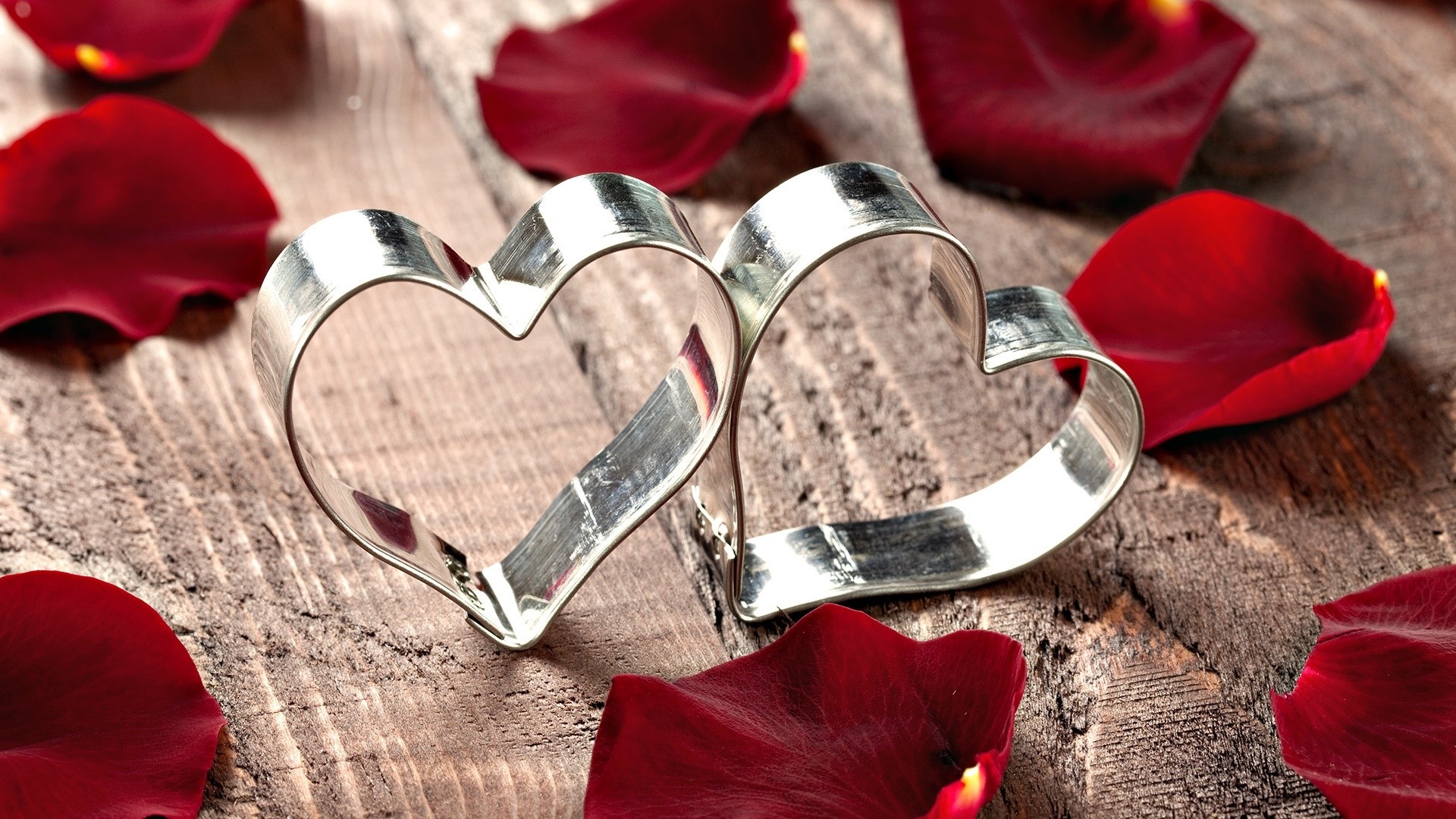 Two hearts cookie cutters with rose petals HD Wallpaper