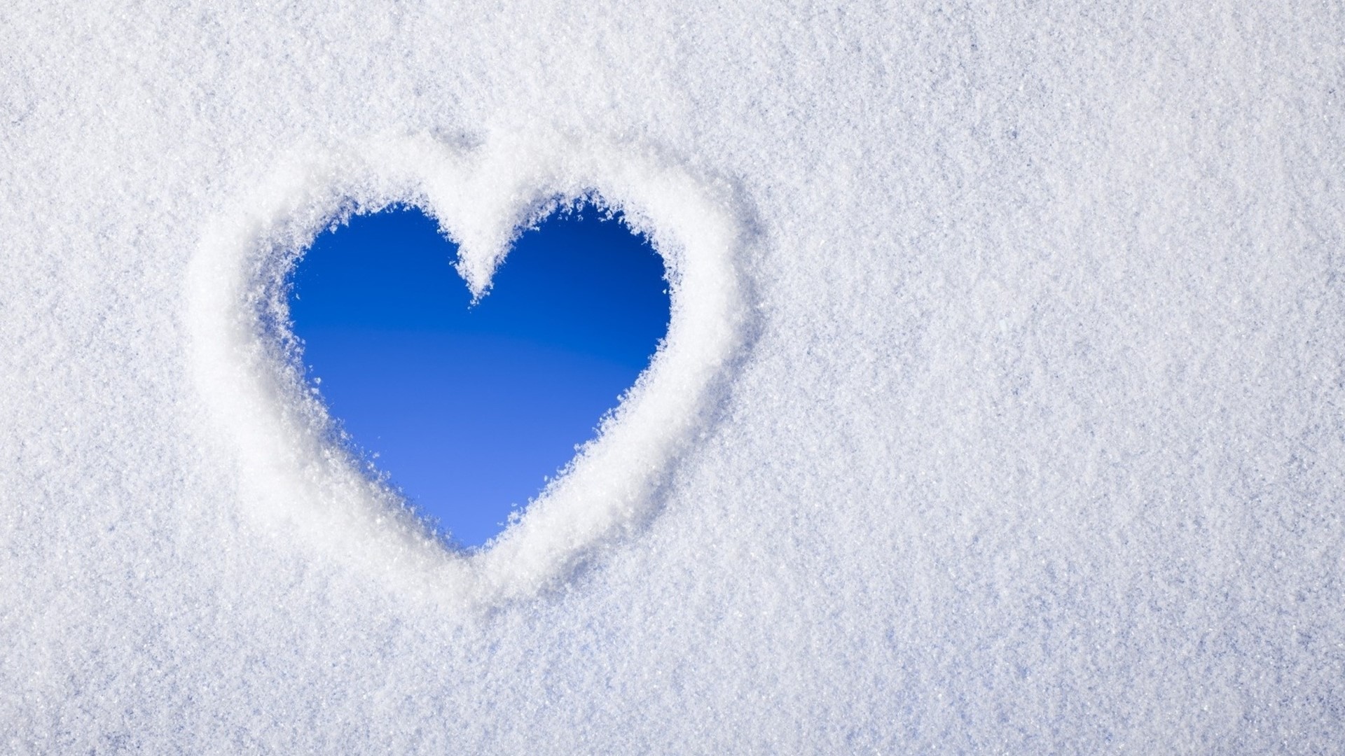 Heart shape in snow HD Wallpaper