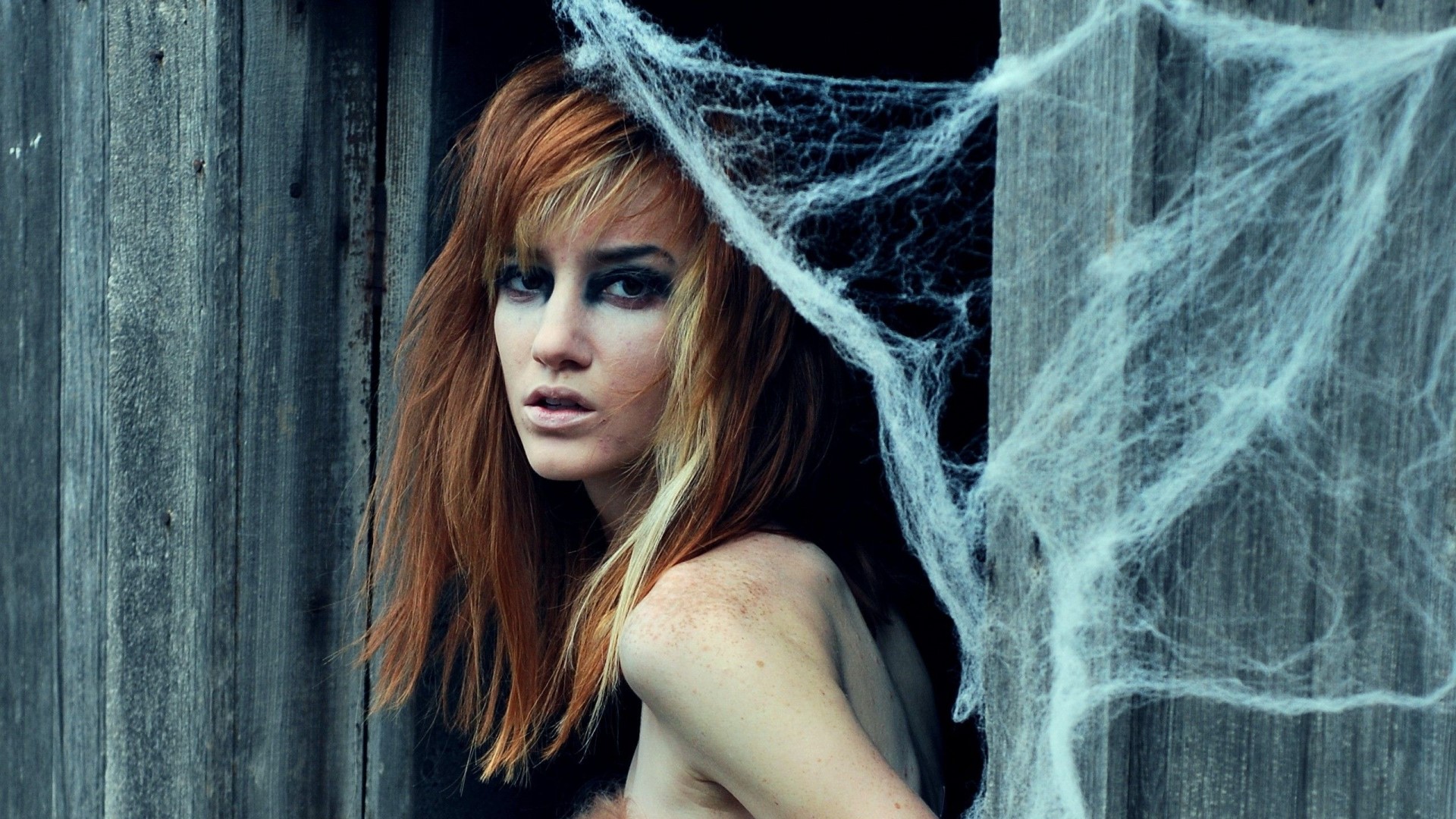 Model with red hair and spiderwebs HD Wallpaper
