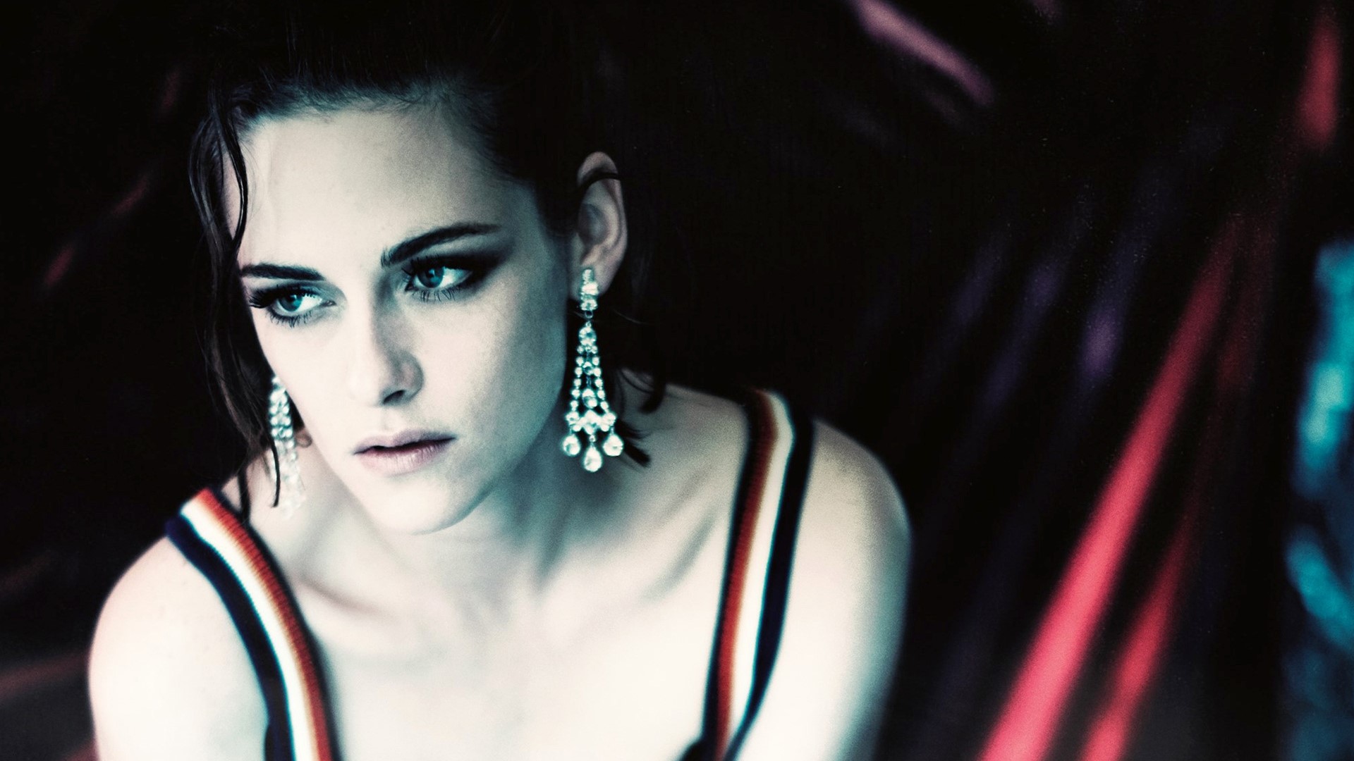Kristen Stewart wearing a striped top and diamond earrings HD Wallpaper