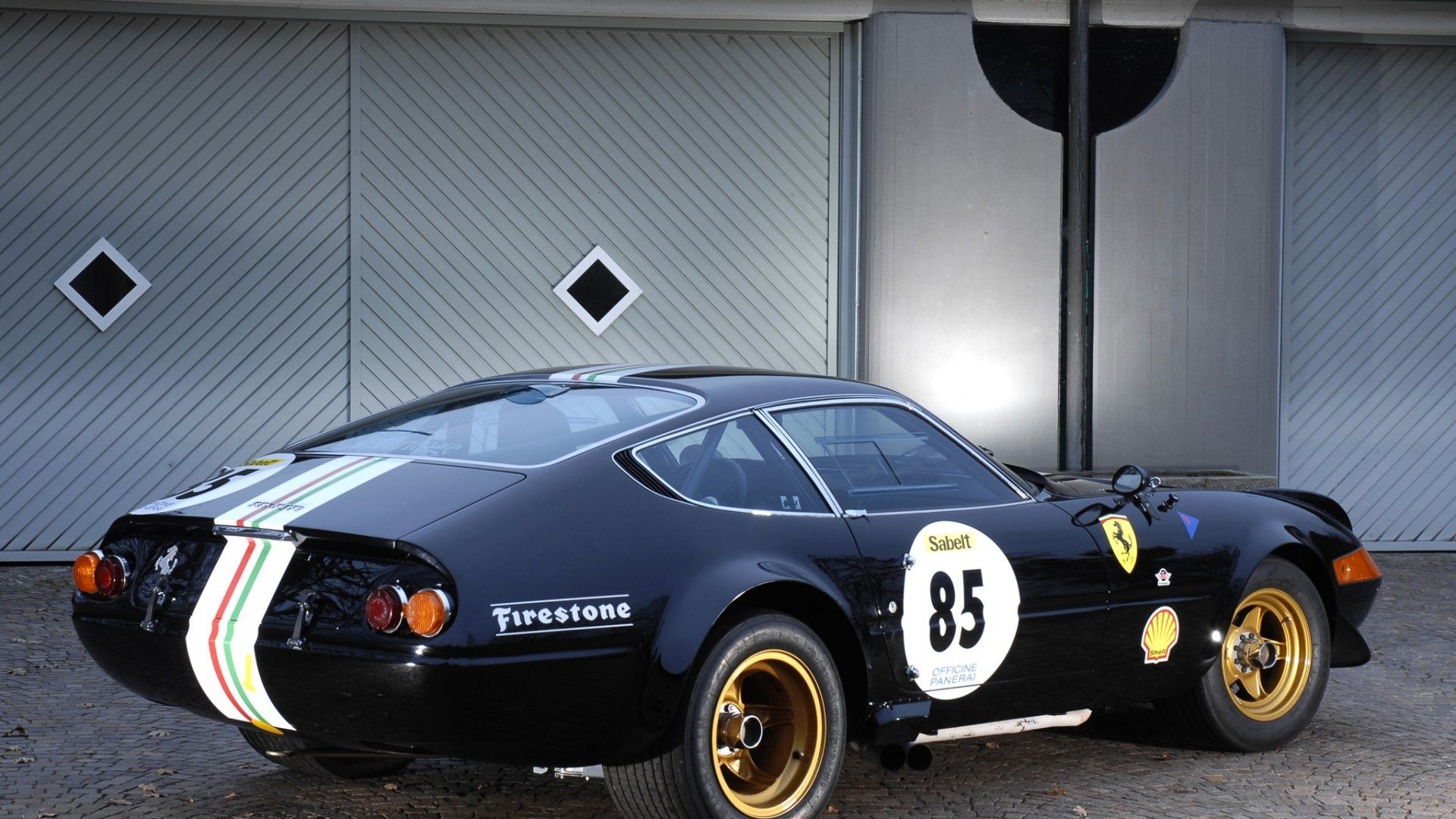 Black Ferrari Daytona with racing stripes and number 85 HD Wallpaper
