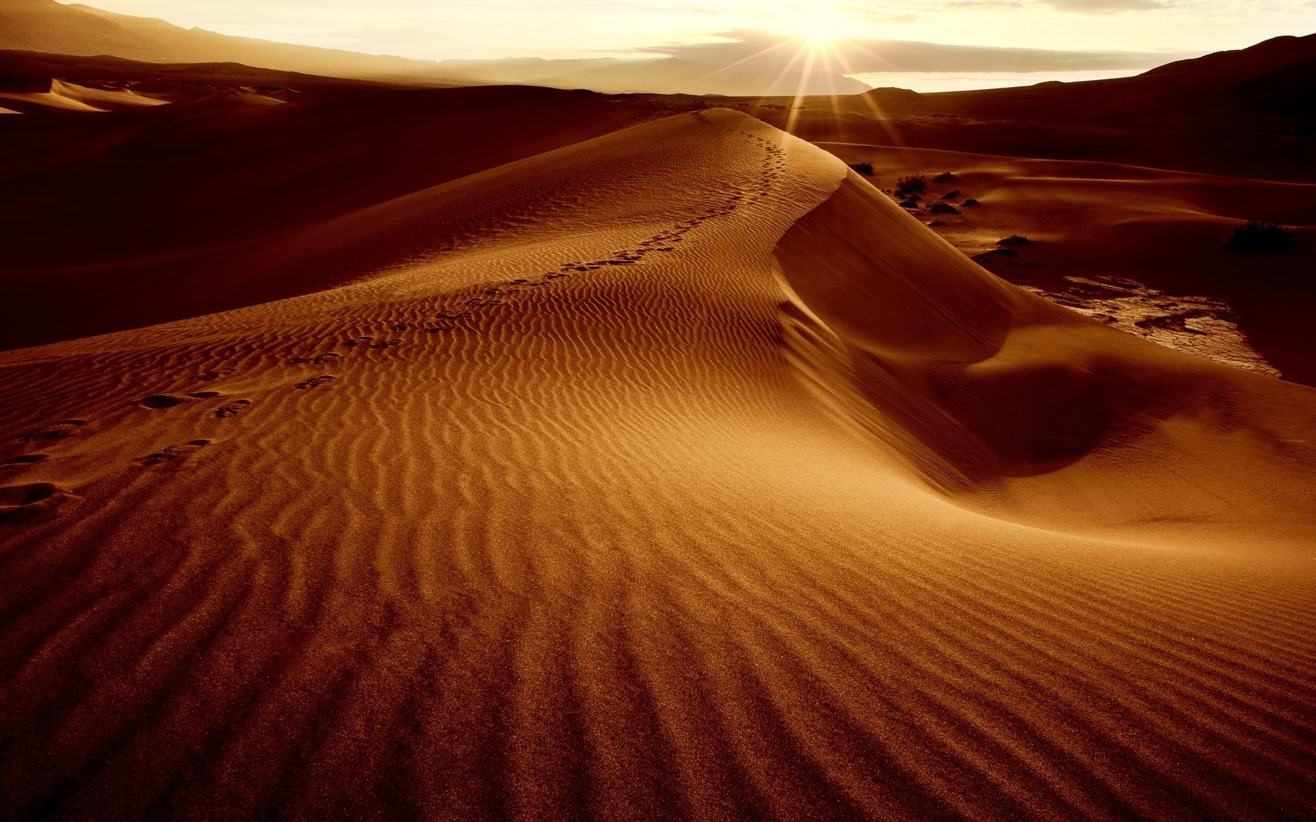 Desert dunes at sunset with footprints HD Wallpaper