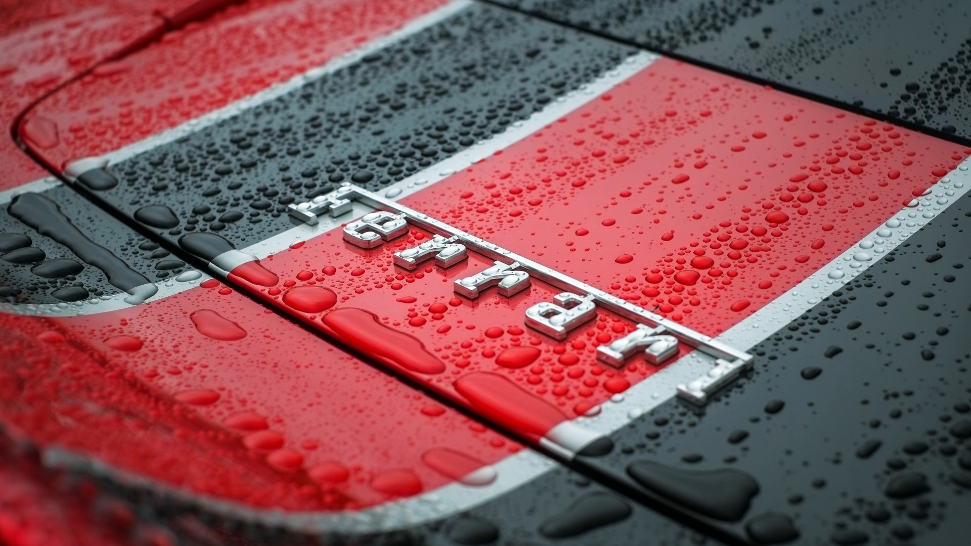Ferrari Logo on a Wet Car Hood HD Wallpaper