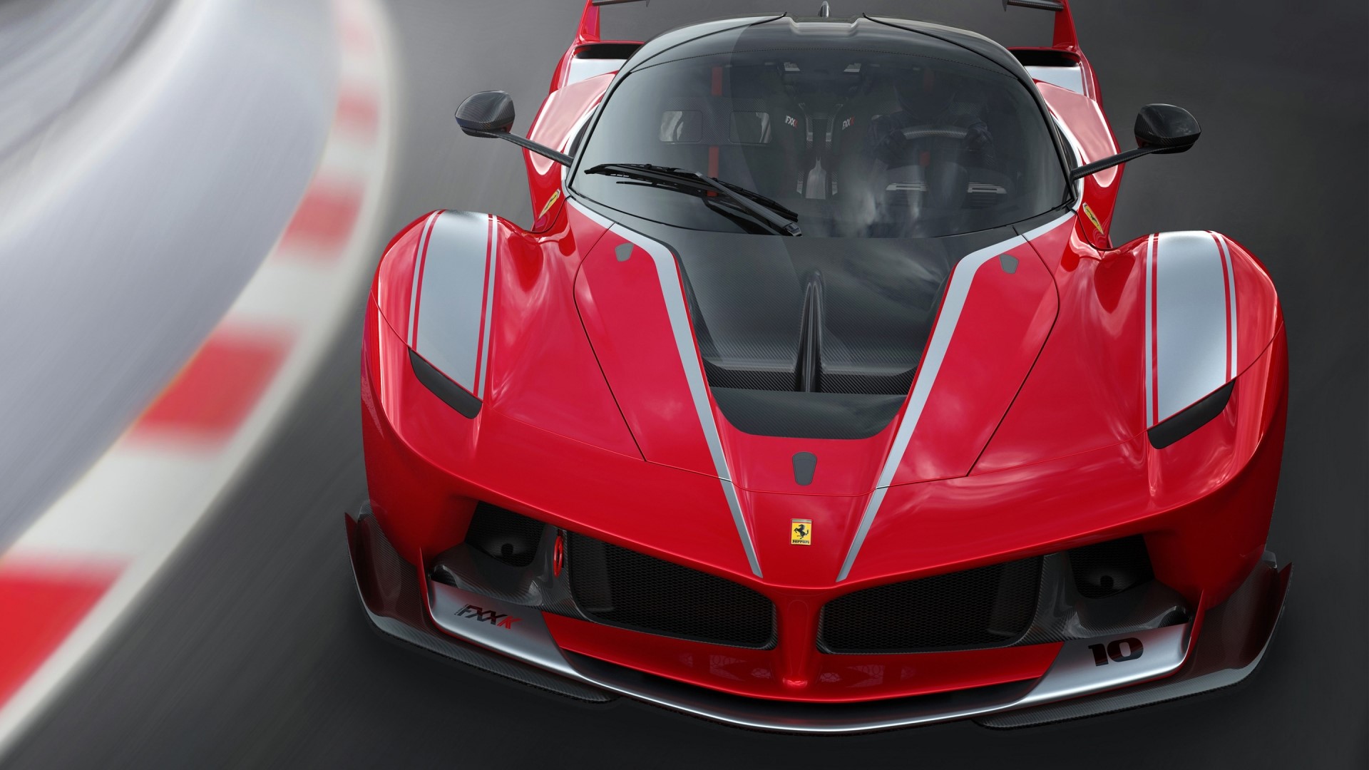 Ferrari FXX K on a race track HD Wallpaper