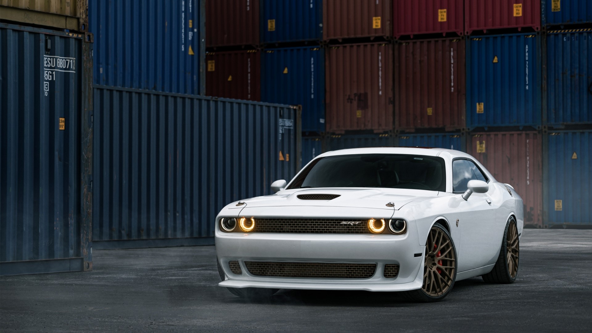 White Dodge Challenger SRT Hellcat parked near shipping containers HD Wallpaper