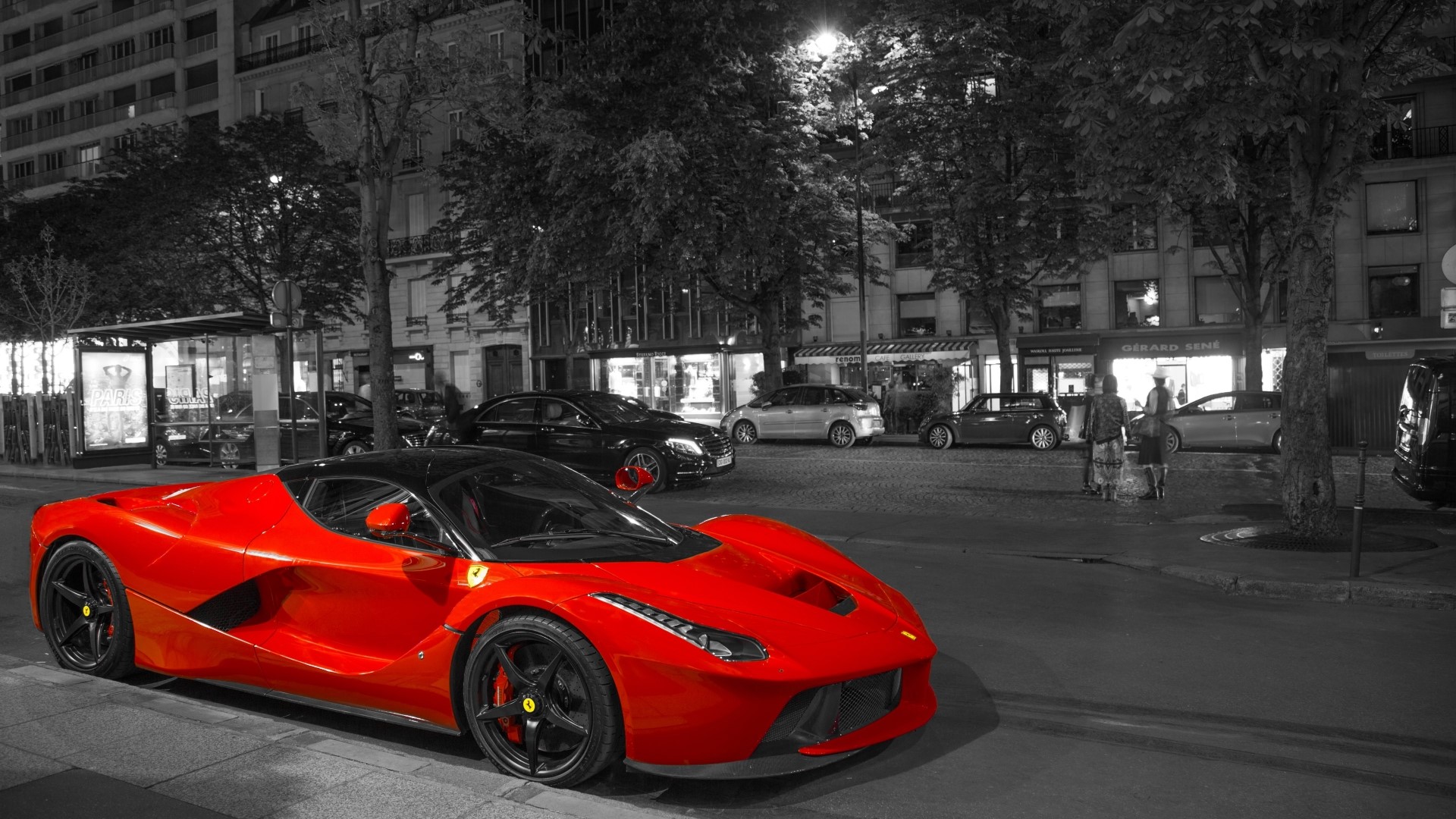 Red Ferrari LaFerrari parked on a city street at night HD Wallpaper
