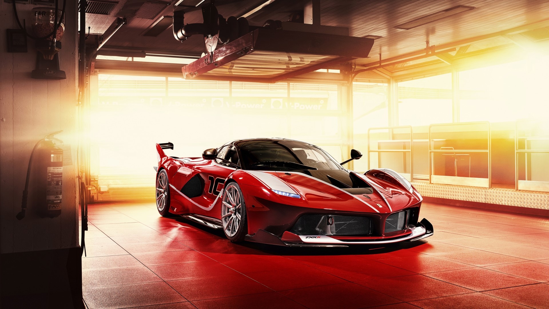 Red Ferrari FXX K Evo in garage HD Wallpaper