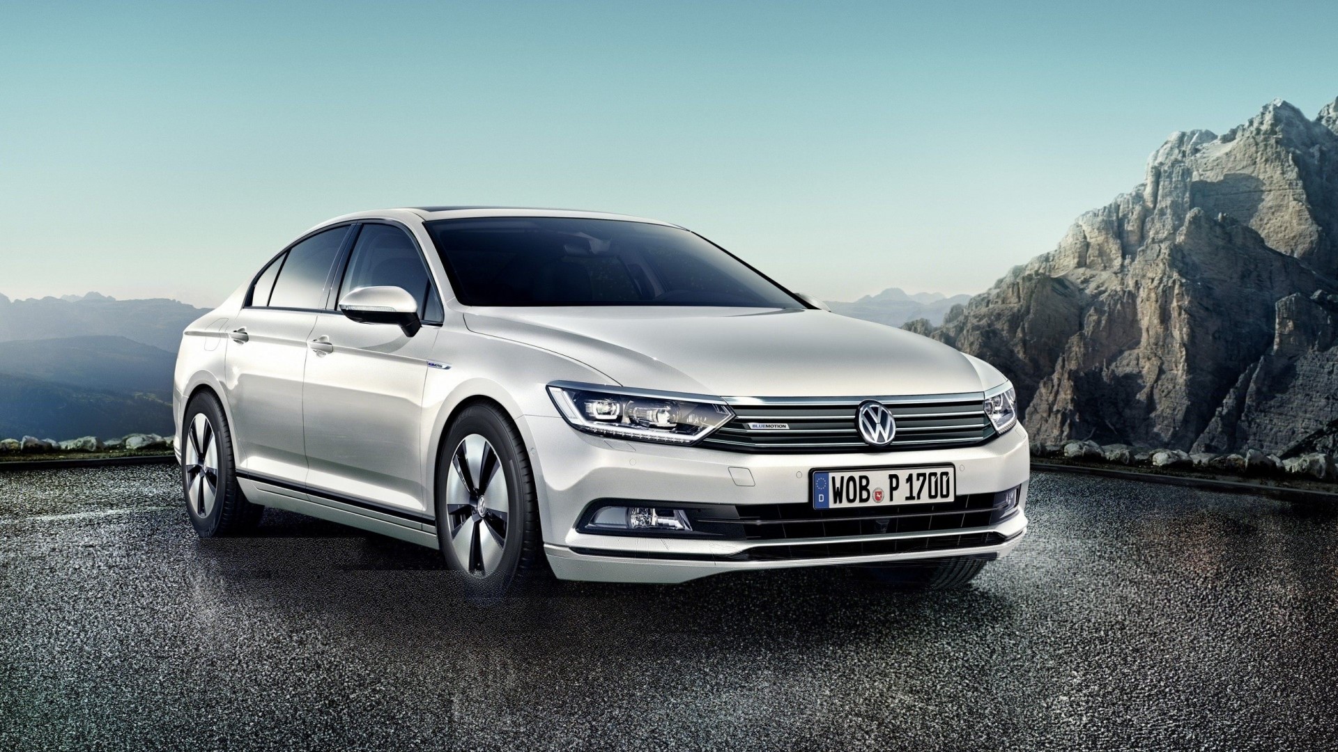 Volkswagen Passat GTE in mountains HD Wallpaper