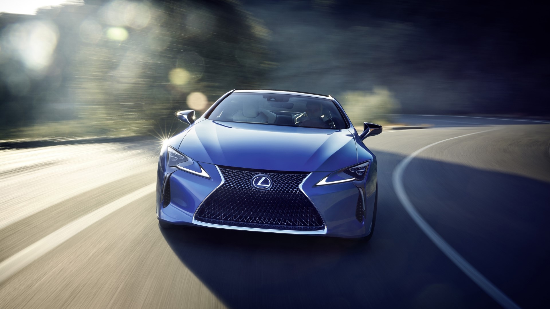 Blue Lexus LC 500 2017 driving on a road HD Wallpaper