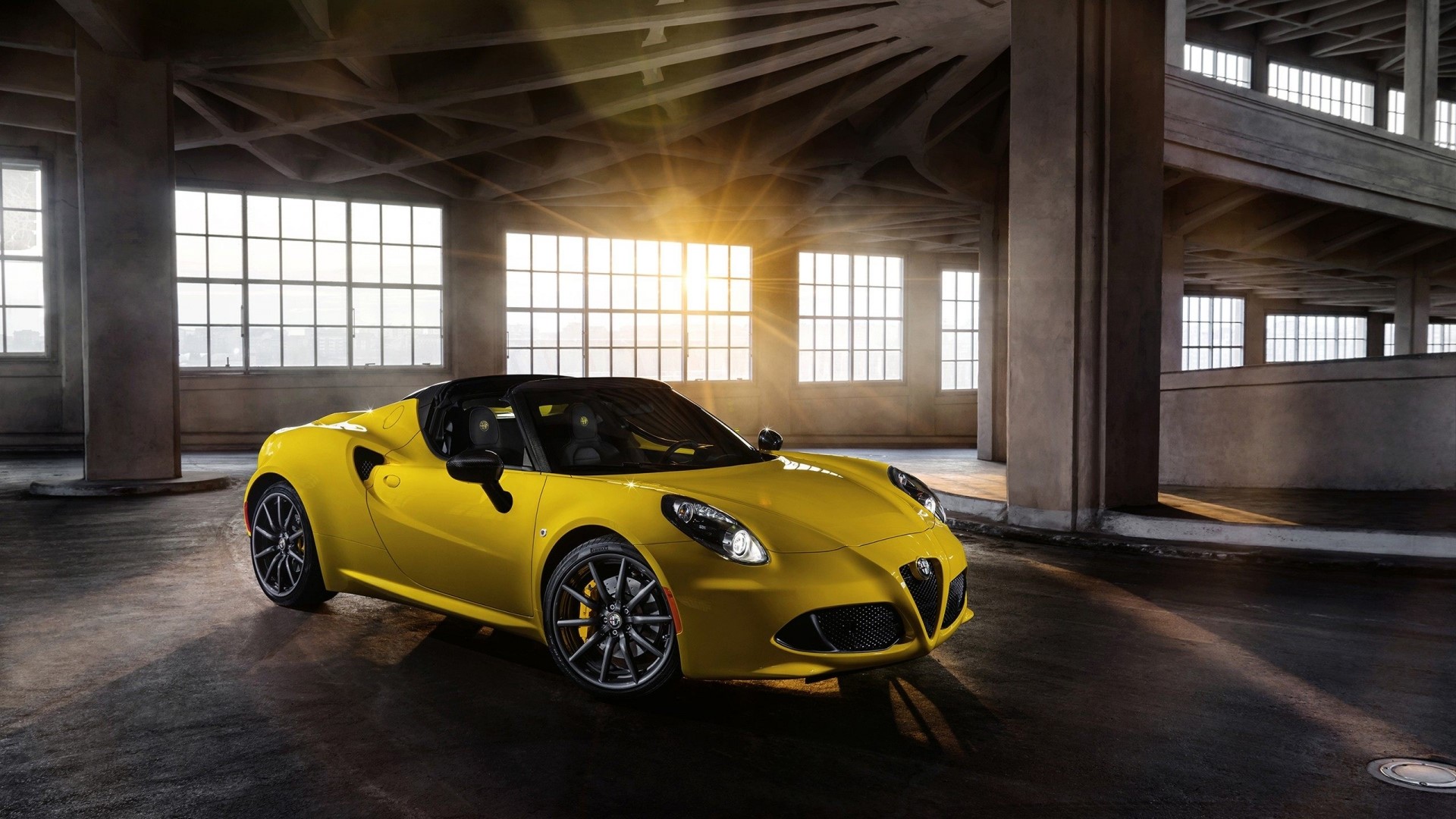 Yellow Alfa Romeo 4C Spider in a warehouse HD Wallpaper
