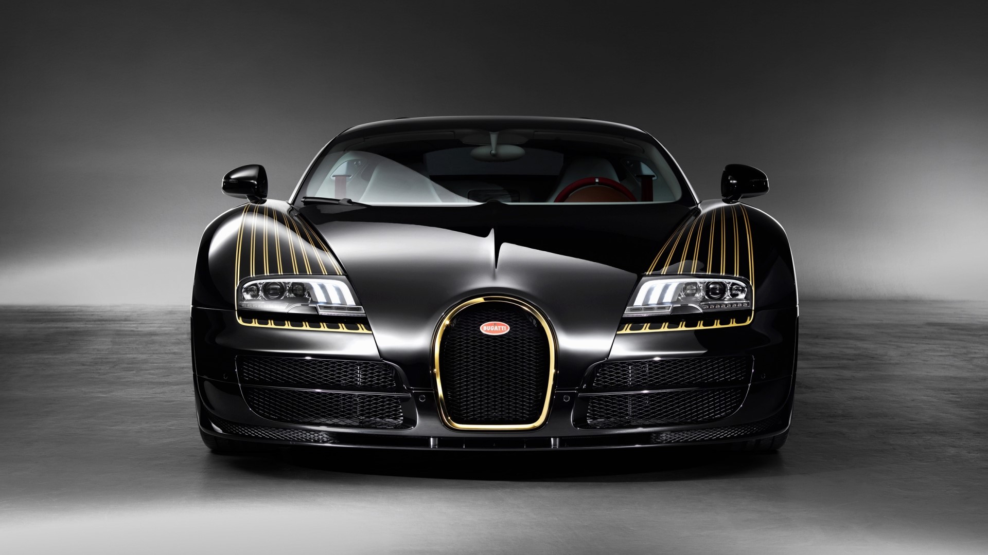 Black Bugatti Veyron with gold accents HD Wallpaper