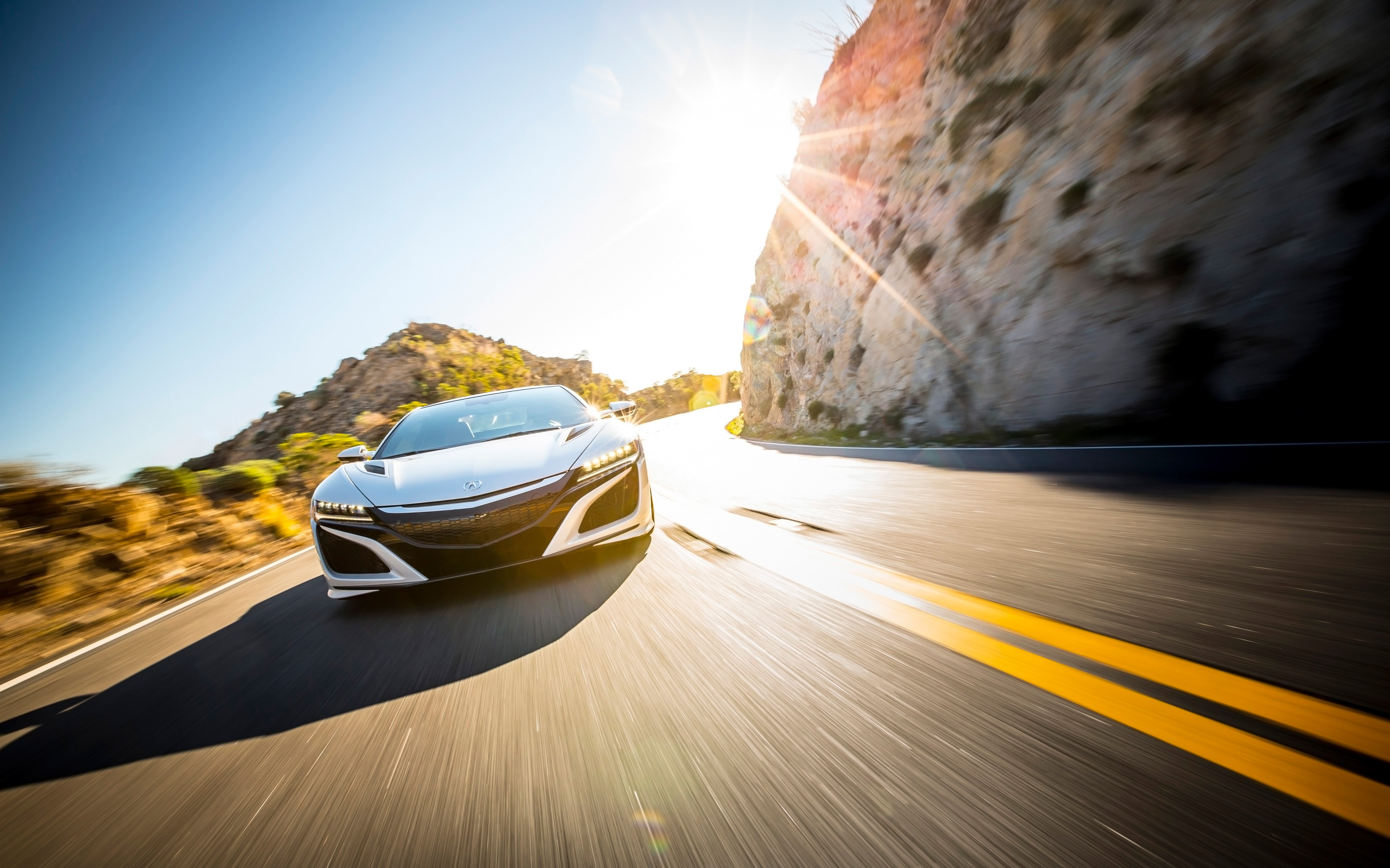 White 2017 Acura NSX driving on a sunny road HD Wallpaper