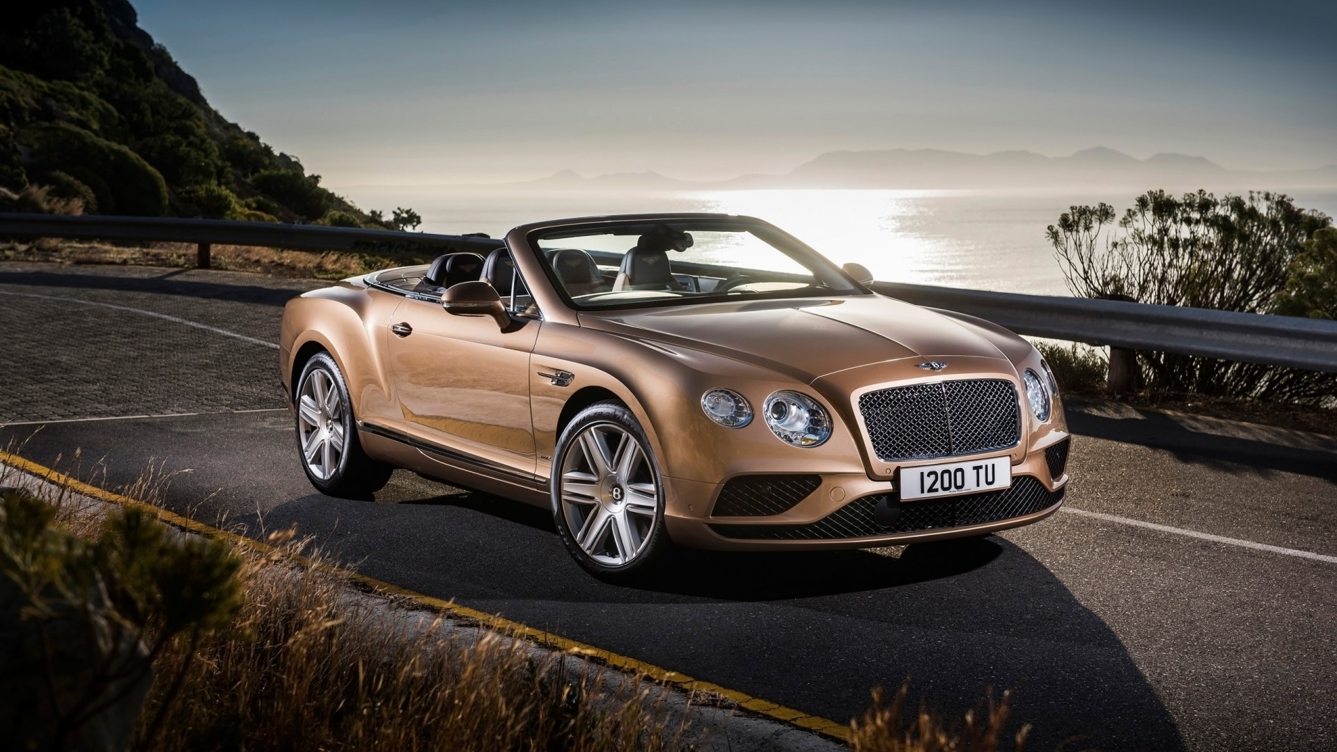 Bentley Continental GT Convertible on a Coastal Road HD Wallpaper